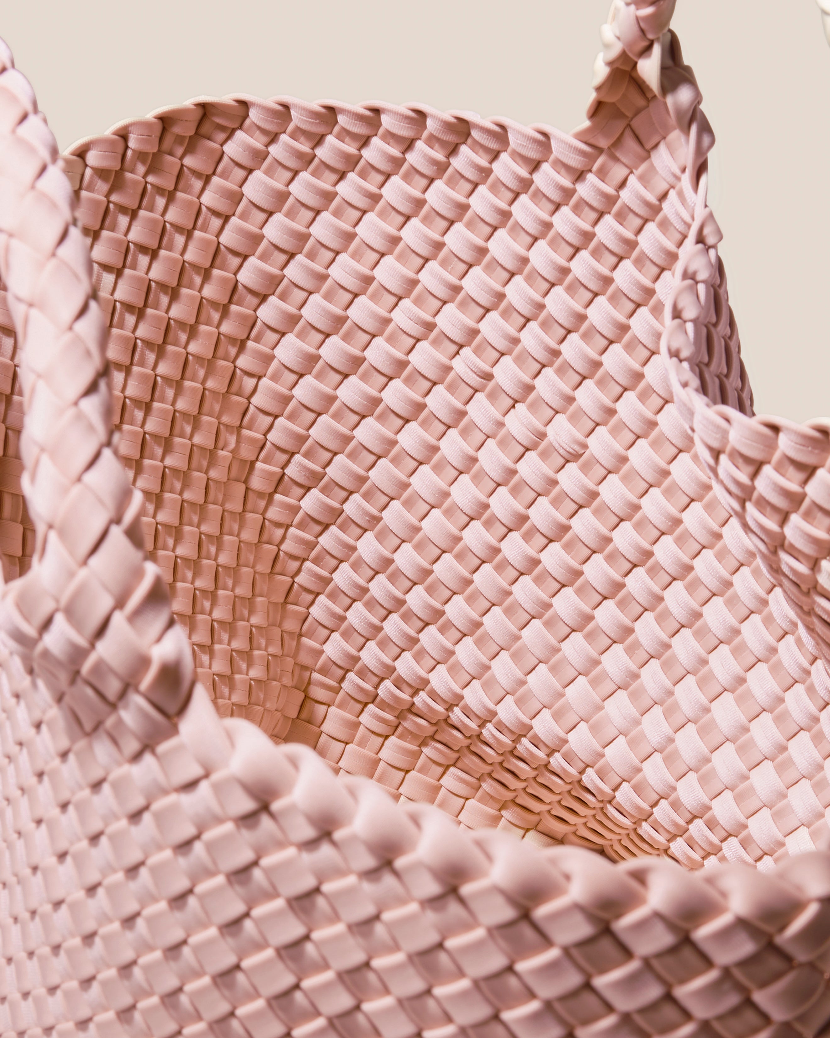 Interior close-up of St. Barths Tote in Petal showing its open top, and unlined interior.