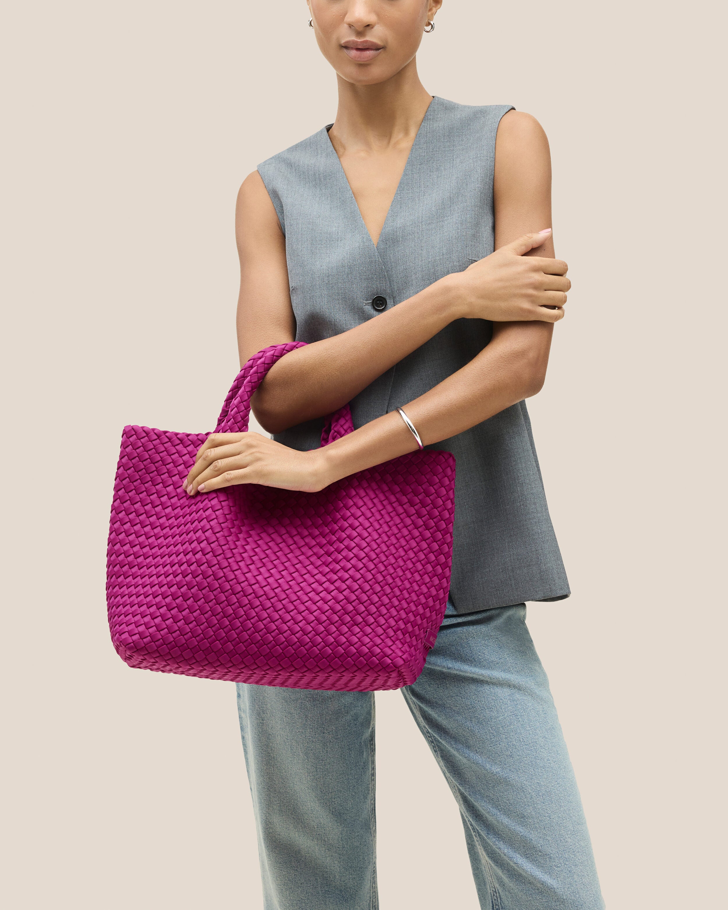 St. Barths Tote in Rio shown on model to illustrate scale and soft silhouette.