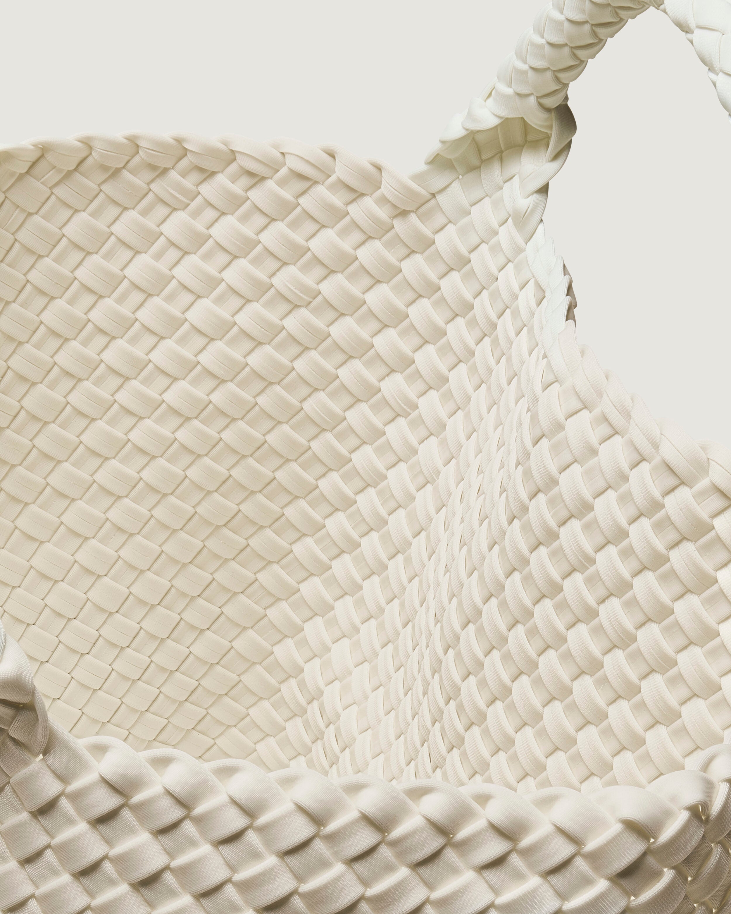 Interior close-up of St. Barths Tote in Salt showing its open top, and unlined interior.