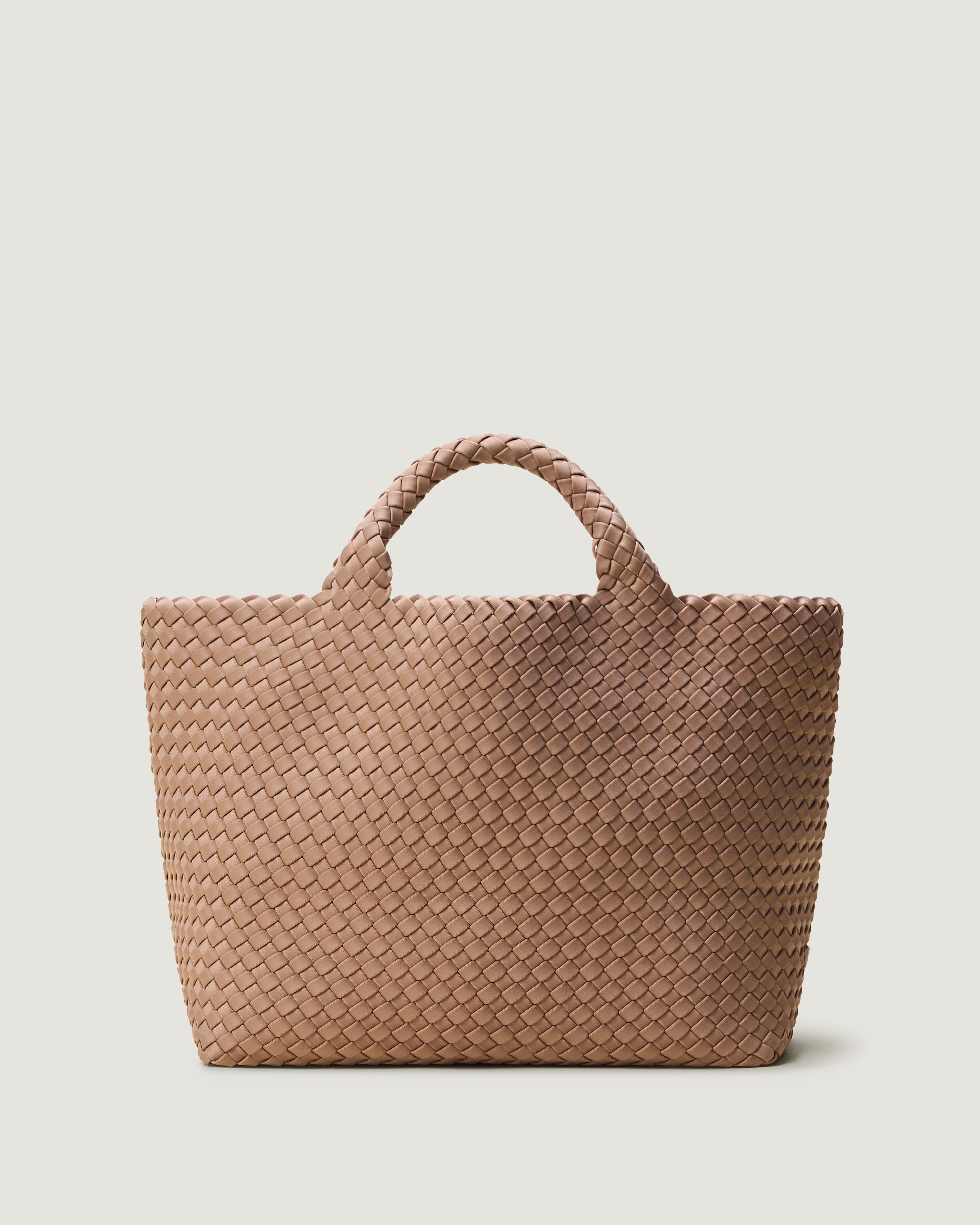 St. Barths Tote in Seychelles, a mocha tone, in handwoven neoprene, featuring an open top, and woven top handles.