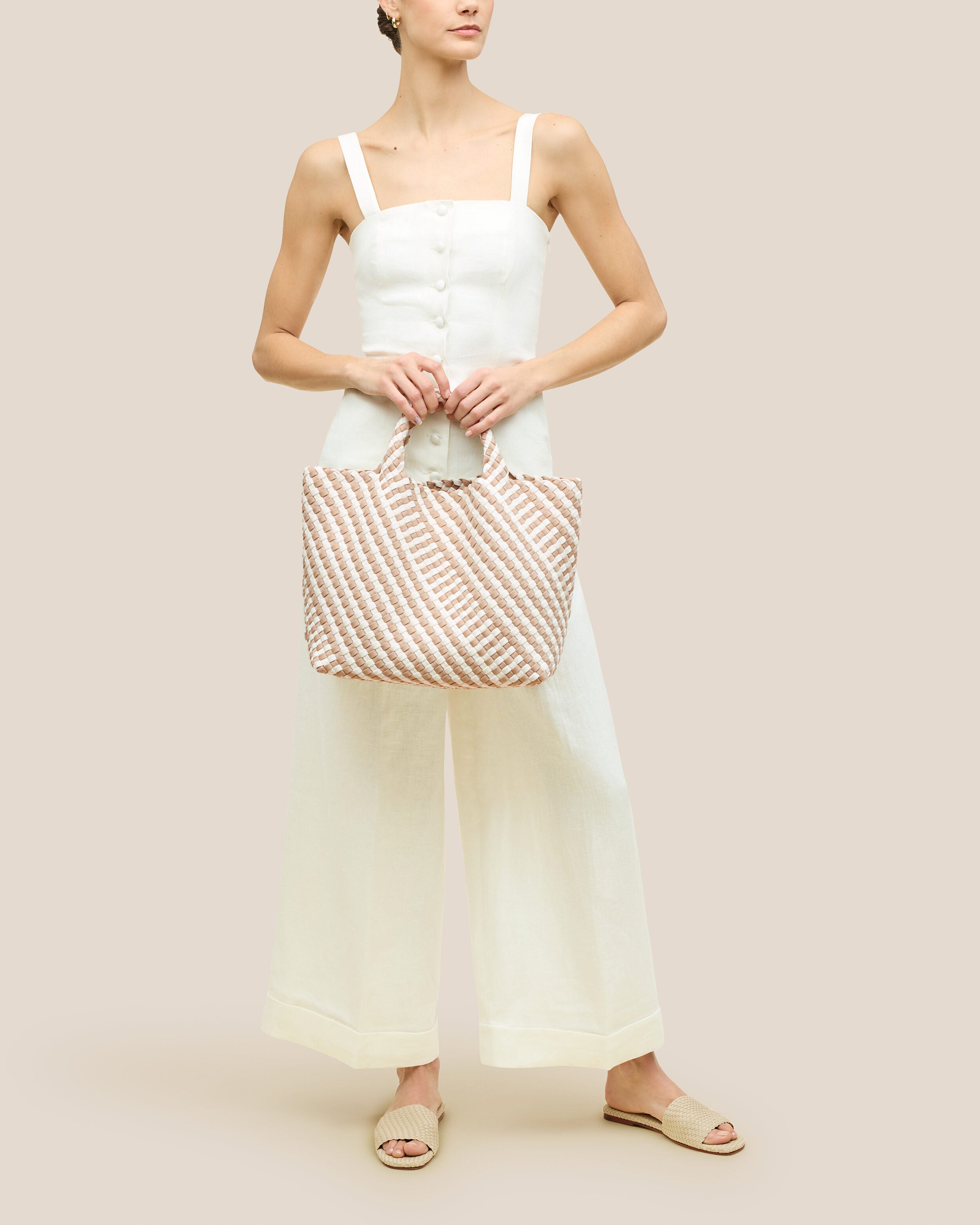 St. Barths Tote in Mykonos shown on model to illustrate scale and soft silhouette.