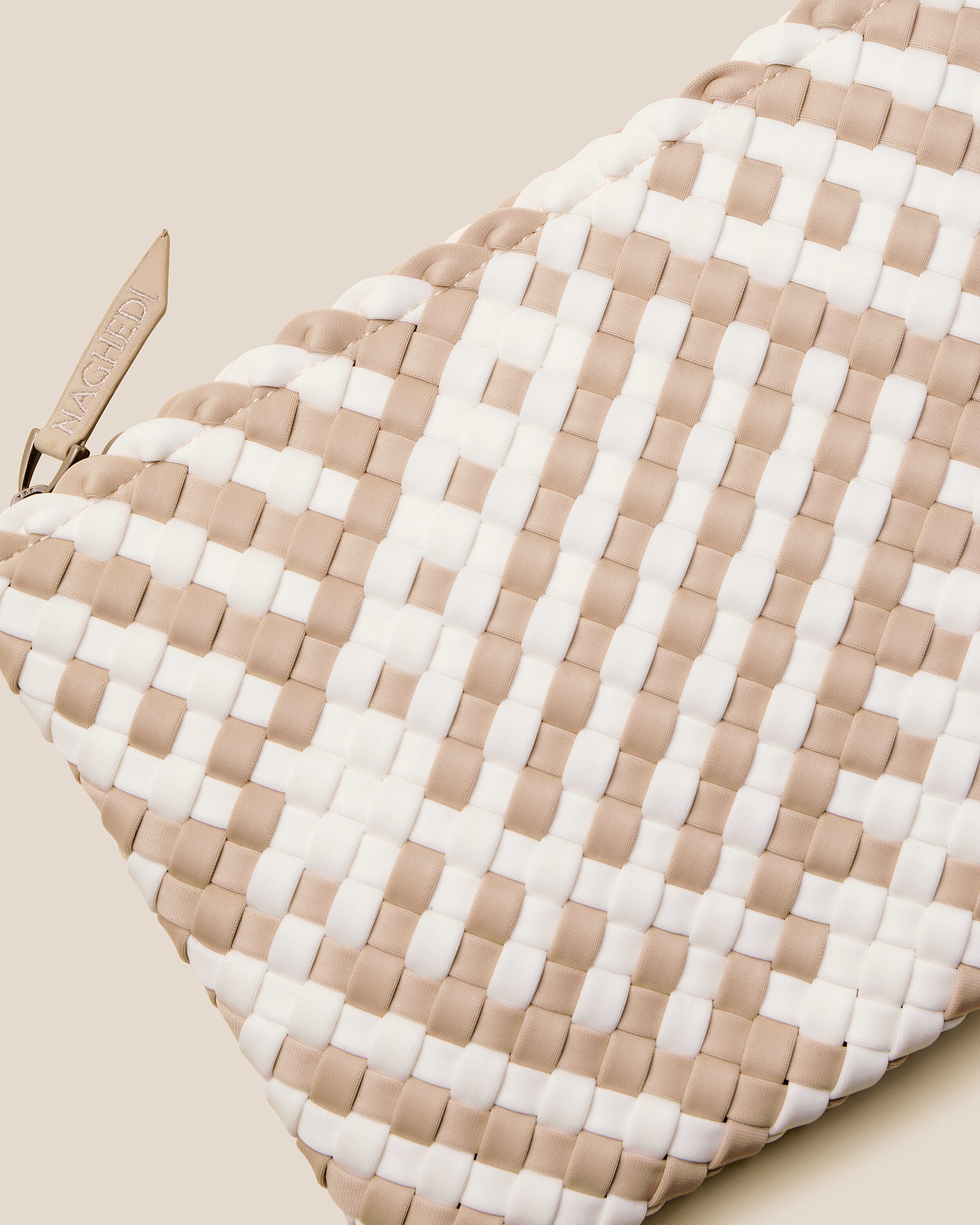 Close-up of included matching woven zippered pouch.