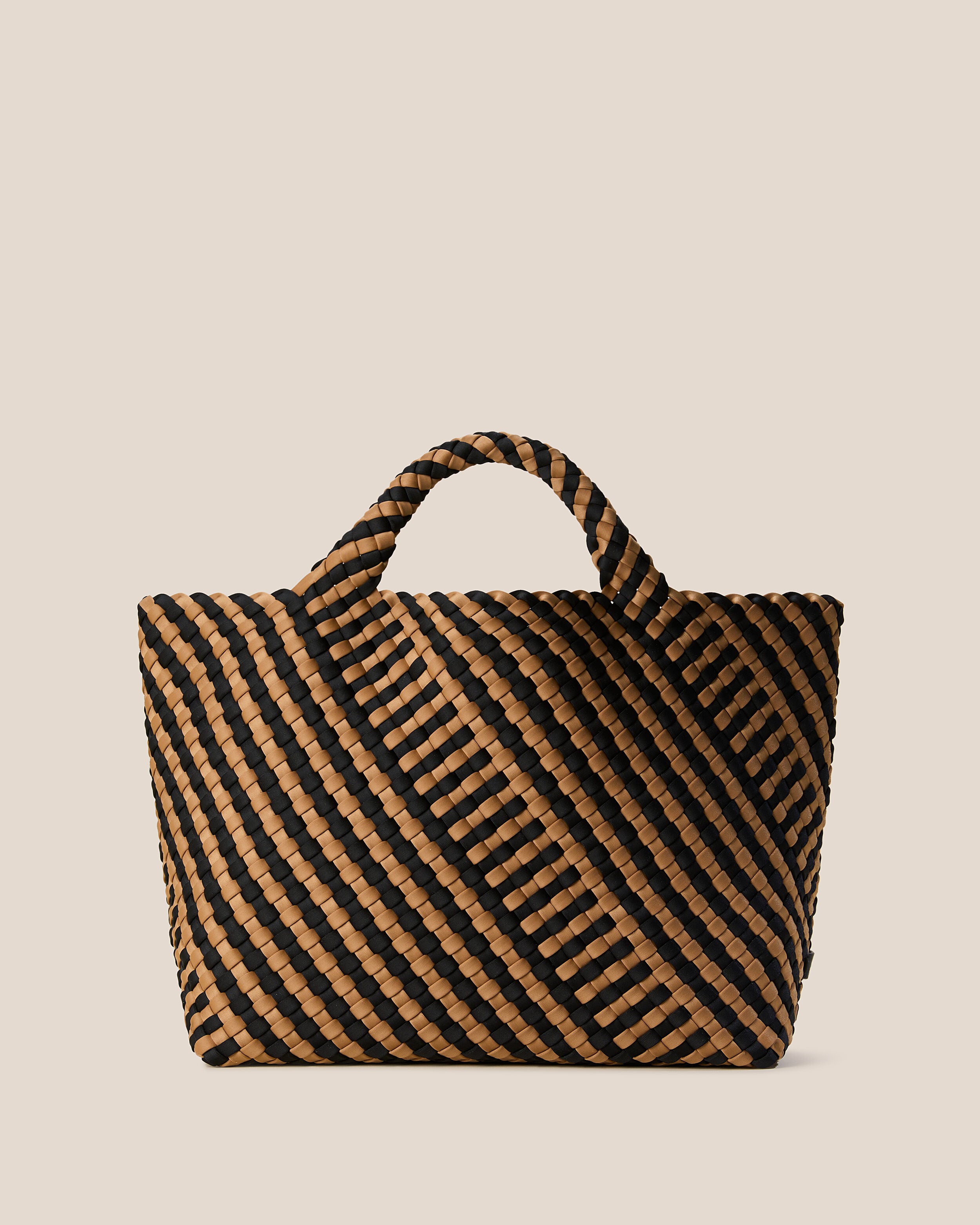 St. Barths Tote in Ravenna, a tan brown and true black tone, in handwoven neoprene, featuring an open top, and woven top handles.
