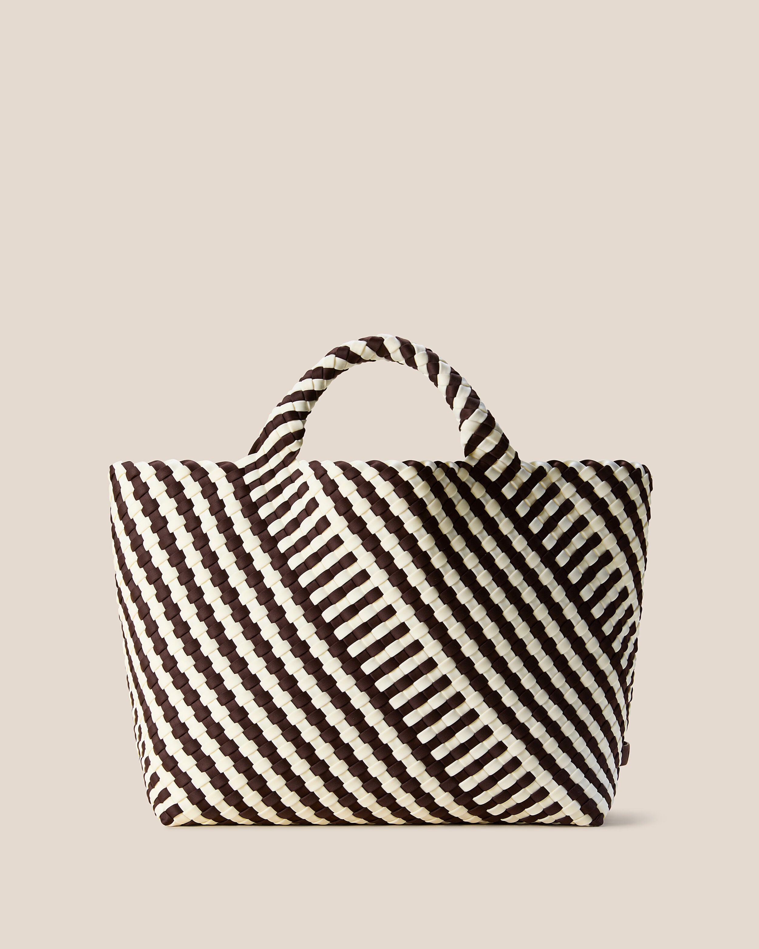 St. Barths Tote in Roma, a chocolate brown and white tone, in handwoven neoprene, featuring an open top, and woven top handles.