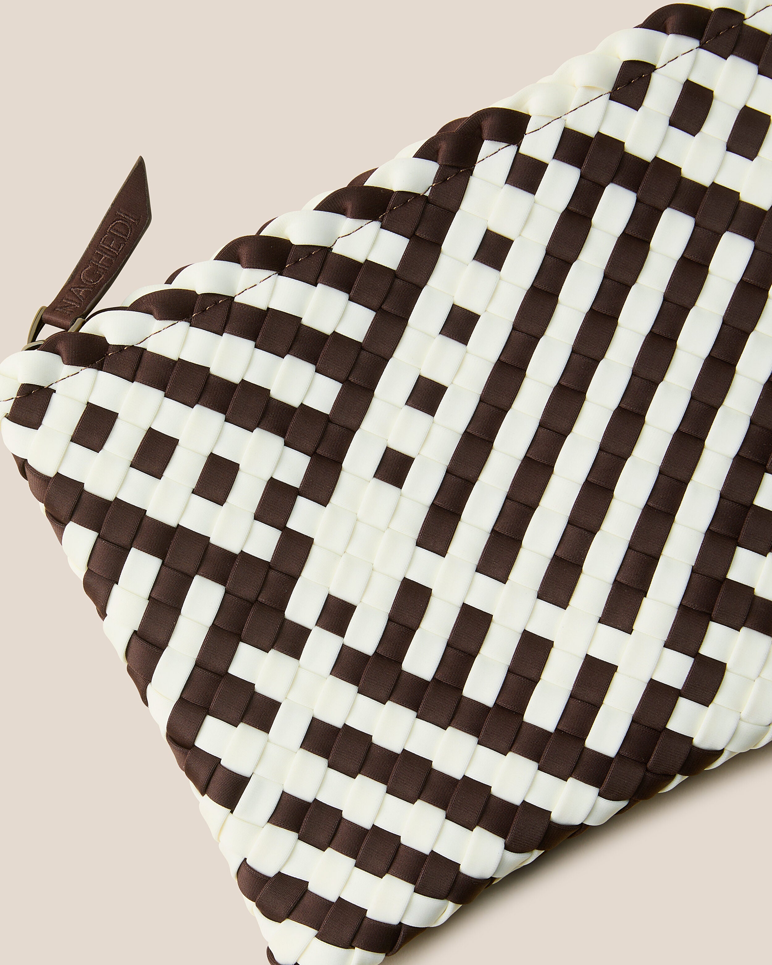 Close-up of included matching woven zippered pouch.