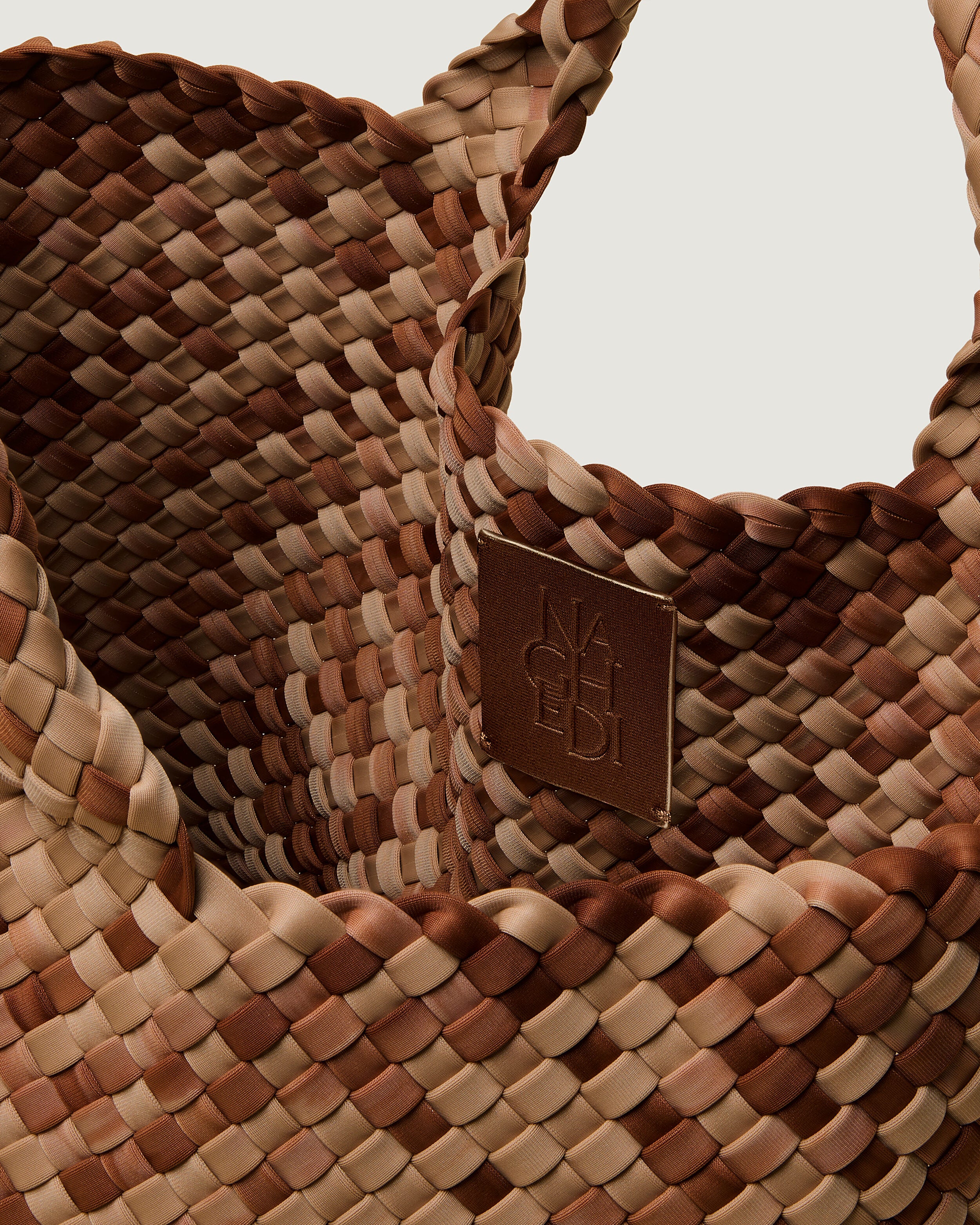 Interior close-up of St. Barths Tote in Fez showing its open top, and unlined interior.