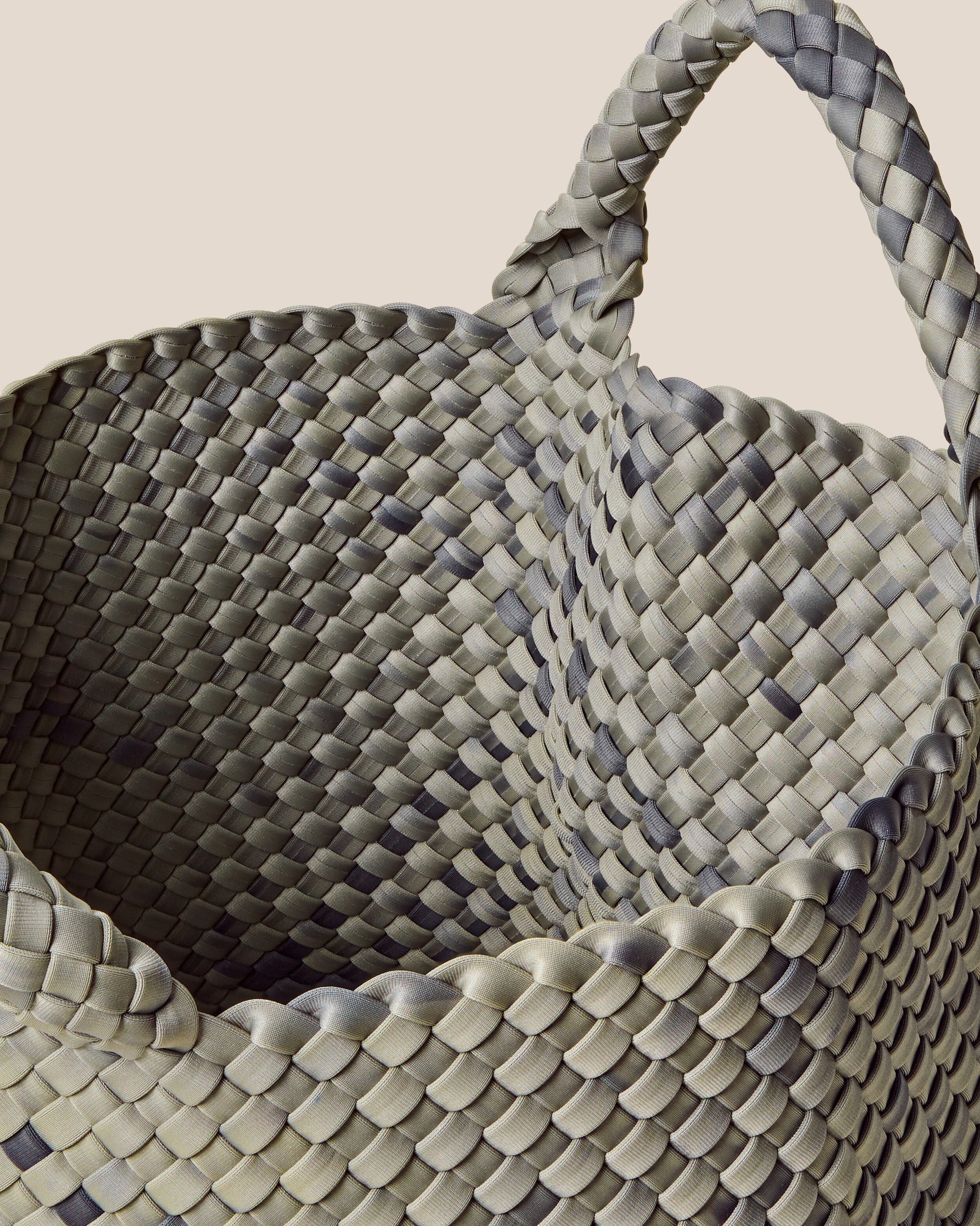 Interior close-up of St. Barths Tote in Neptune showing its open top, and unlined interior.