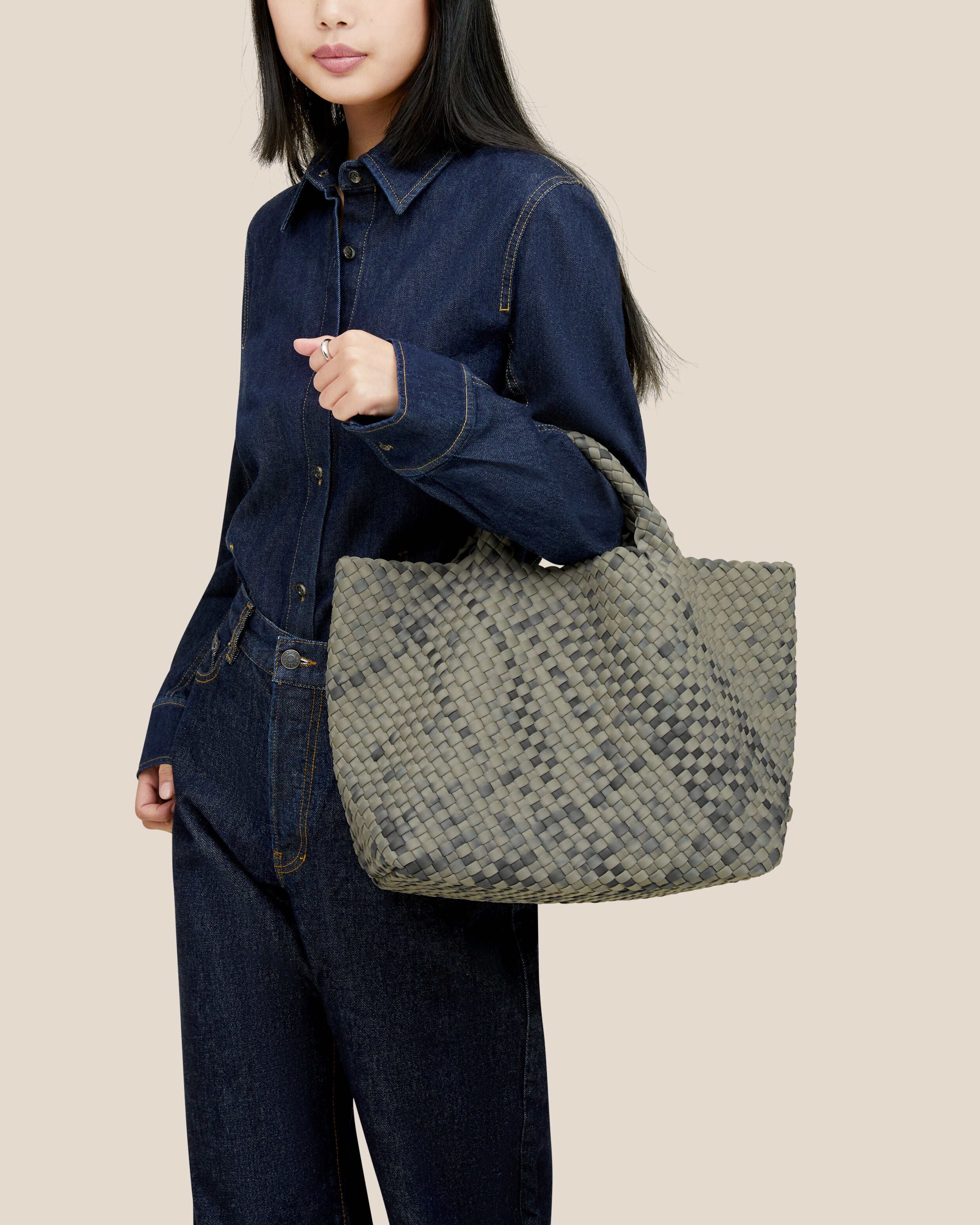 St. Barths Tote in Neptune shown on model to illustrate scale and soft silhouette.