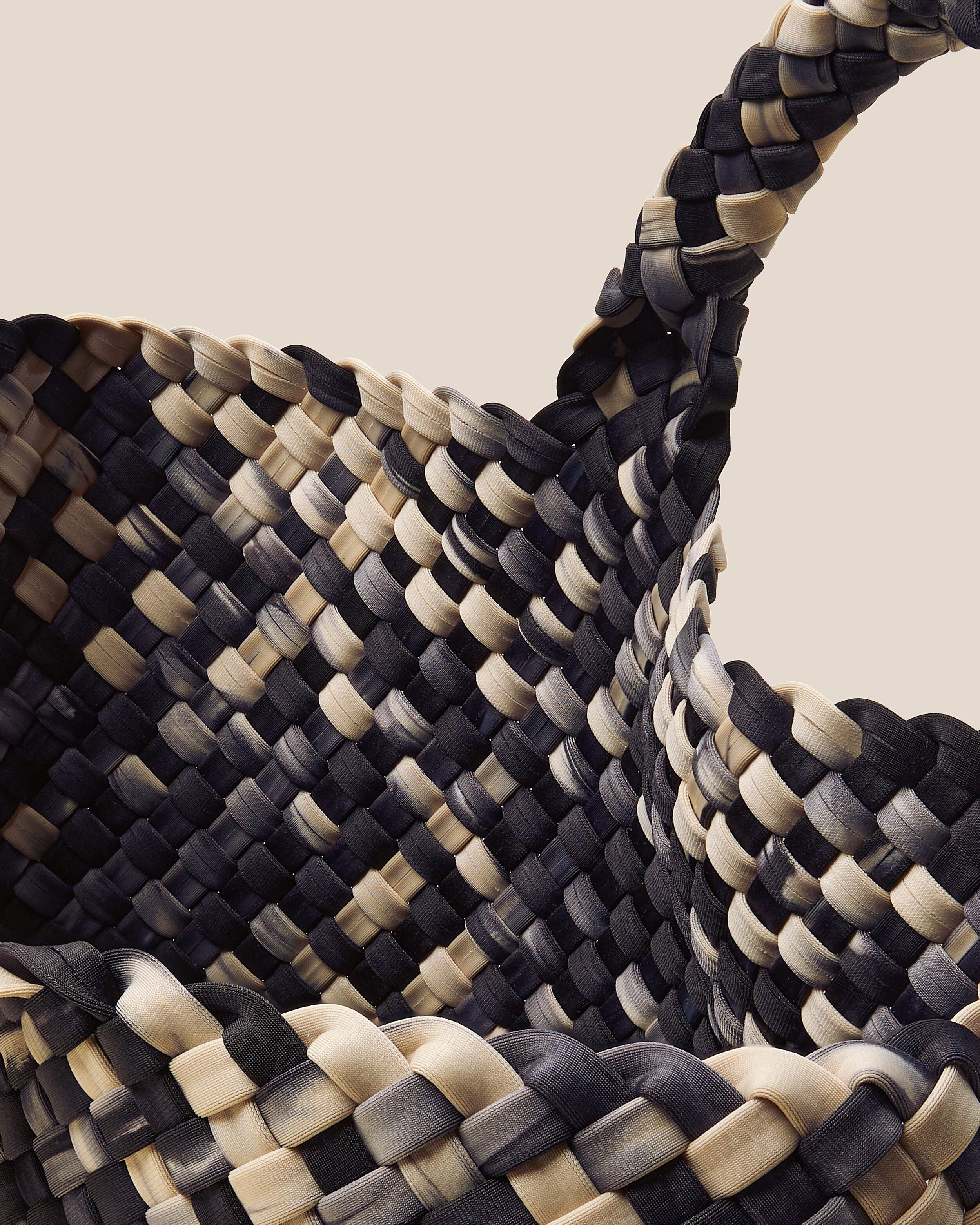 Interior close-up of St. Barths Tote in Nimbus showing its open top, and unlined interior.