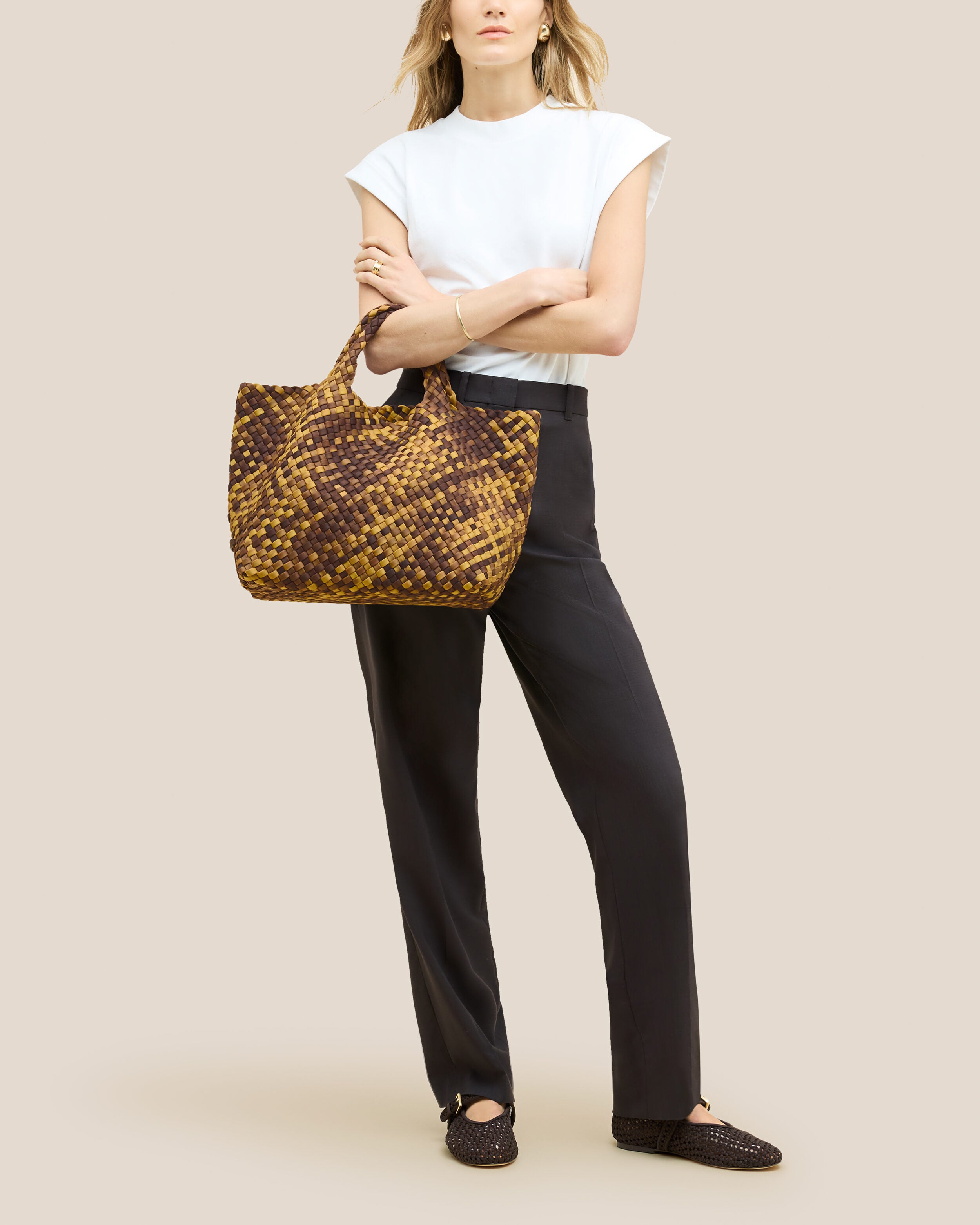 St. Barths Tote in Tortoiseshell shown on model to illustrate scale and soft silhouette.