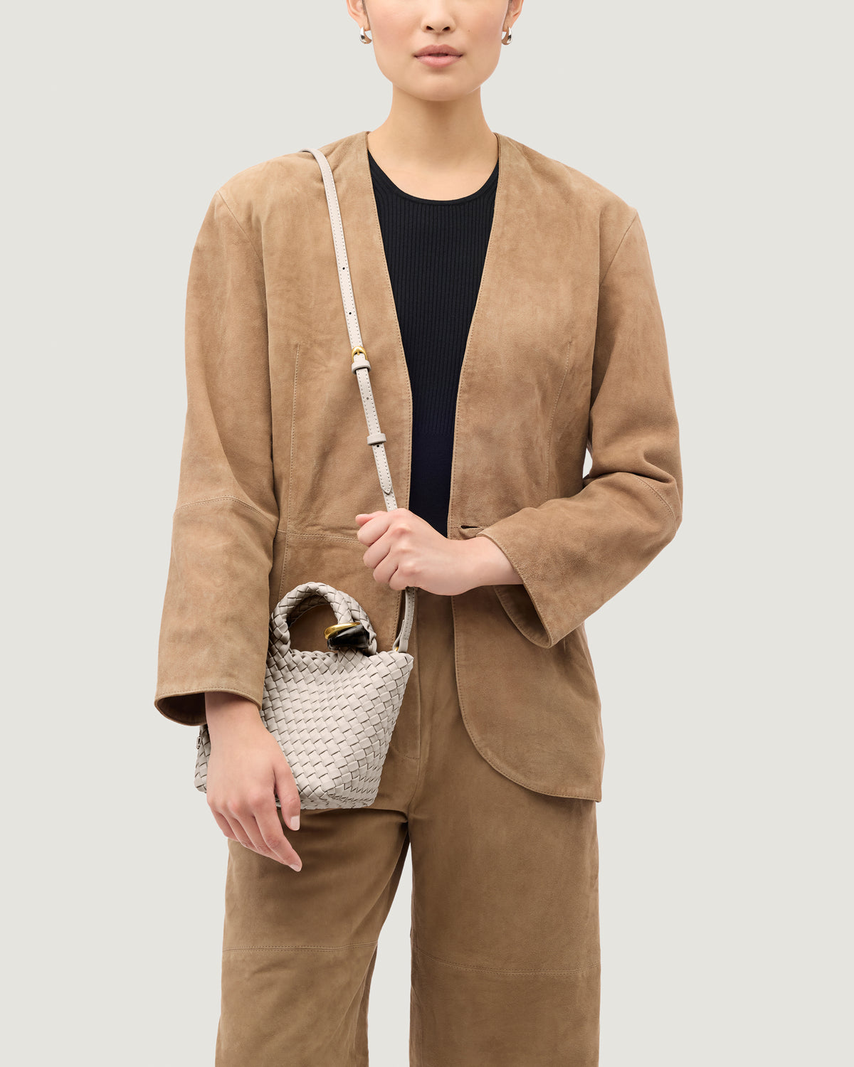 St. Barths Tote in Linen shown on model to illustrate scale and soft silhouette.