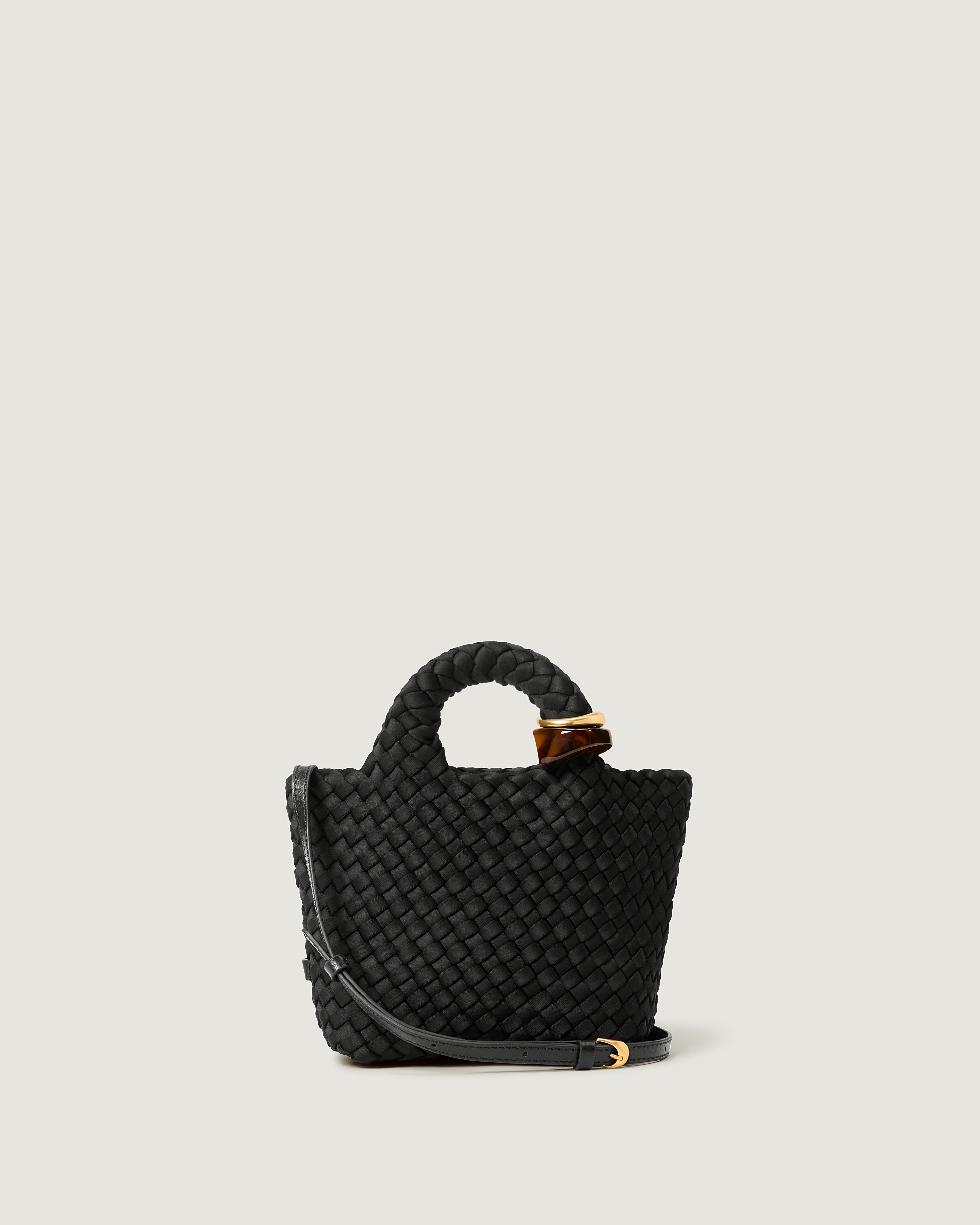 St. Barths Tote in Onyx, a true black tone, in handwoven neoprene, featuring an open top, beads on front handle, and leather strap.