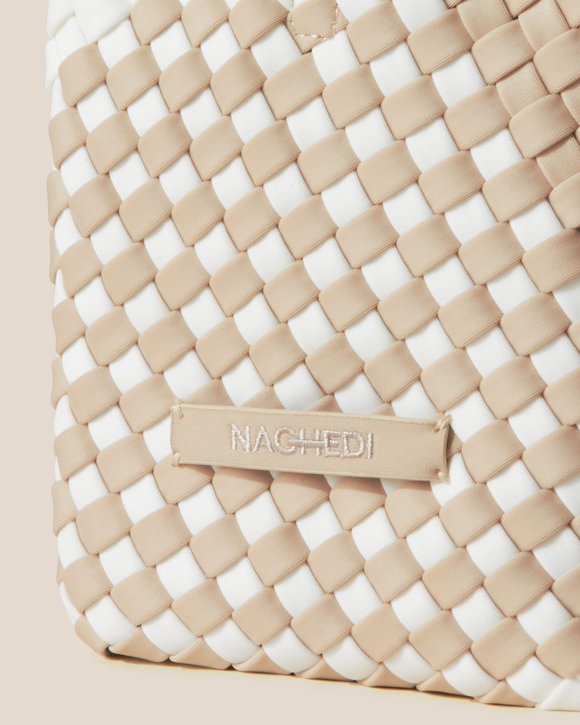 Close-up of stamped NAGHEDI logo on St. Barths Tote in Athena.