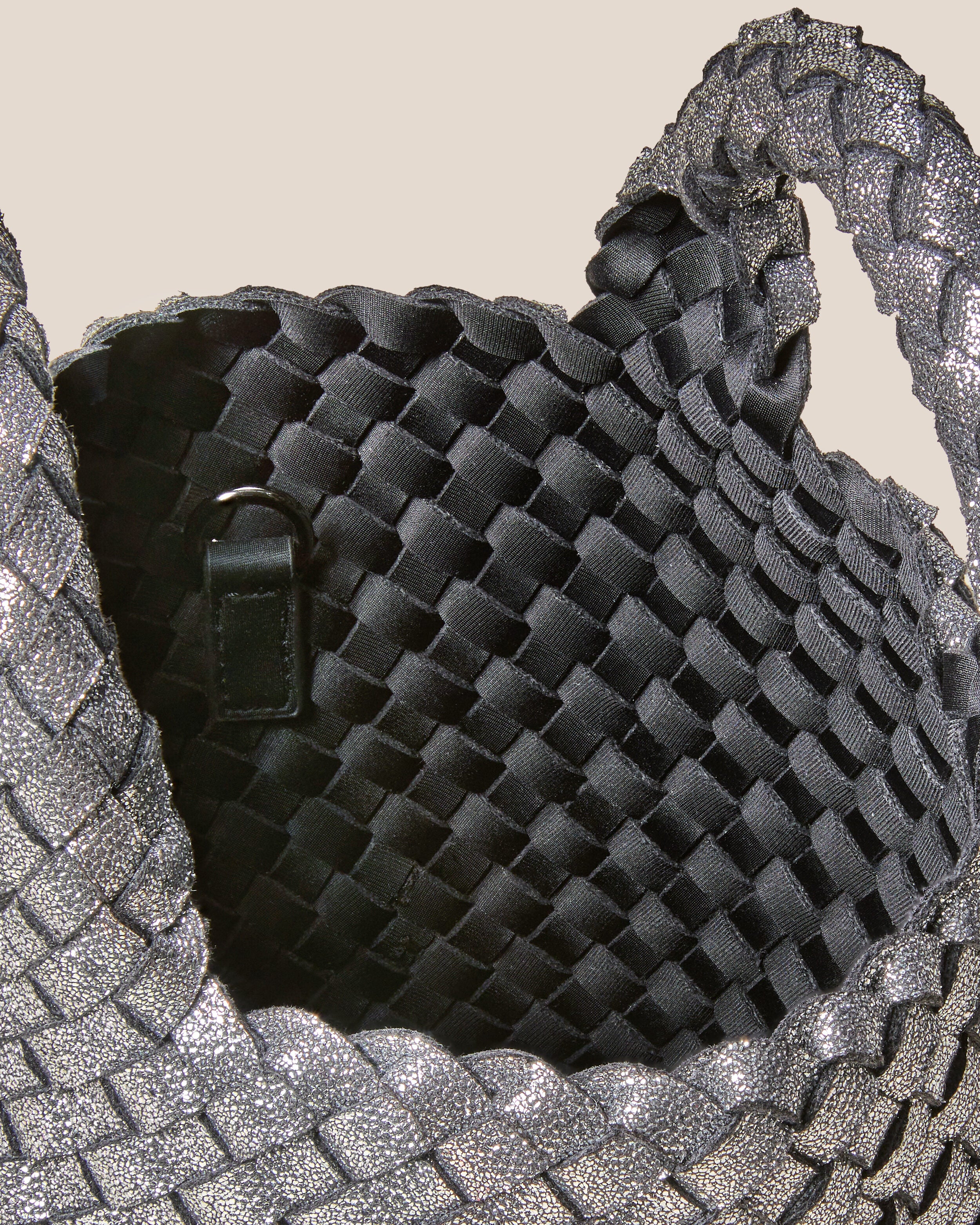 Interior close-up of St. Barths Tote in Titanium showing its open top, and unlined interior.