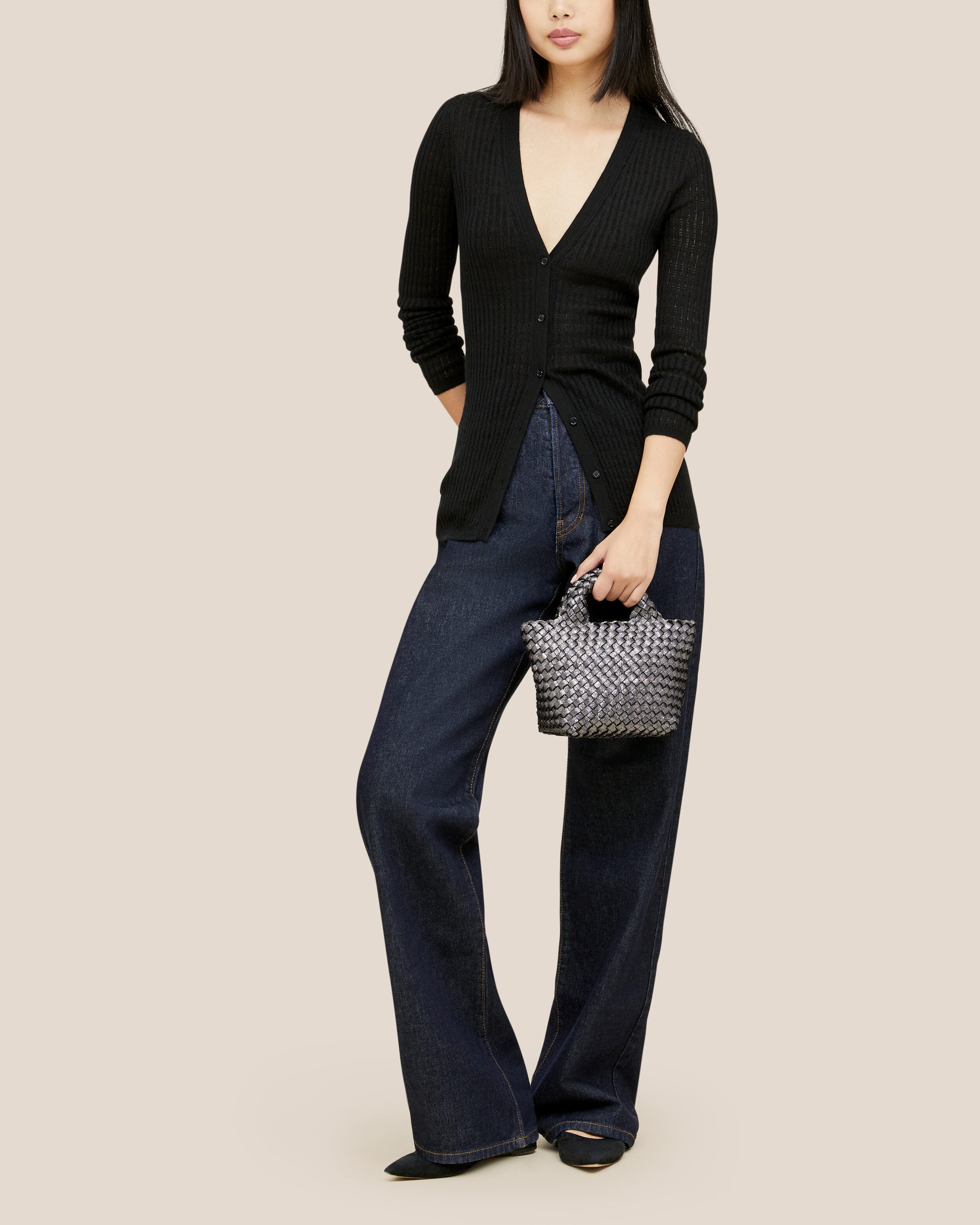 St. Barths Tote in Titanium shown on model to illustrate scale and soft silhouette.