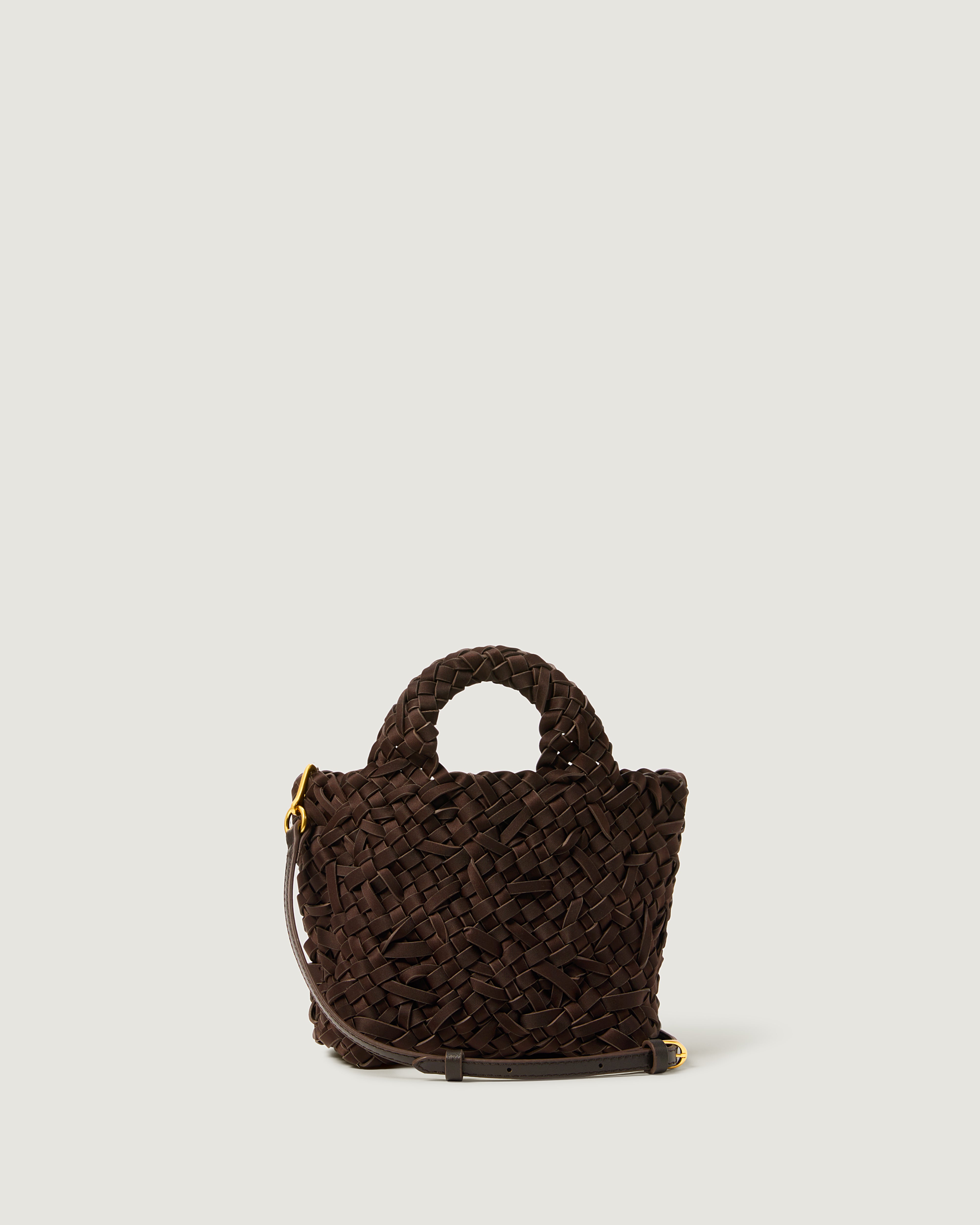 A chocolate brown woven basket-style neoprene handbag with a top handle and a leather shoulder strap.
