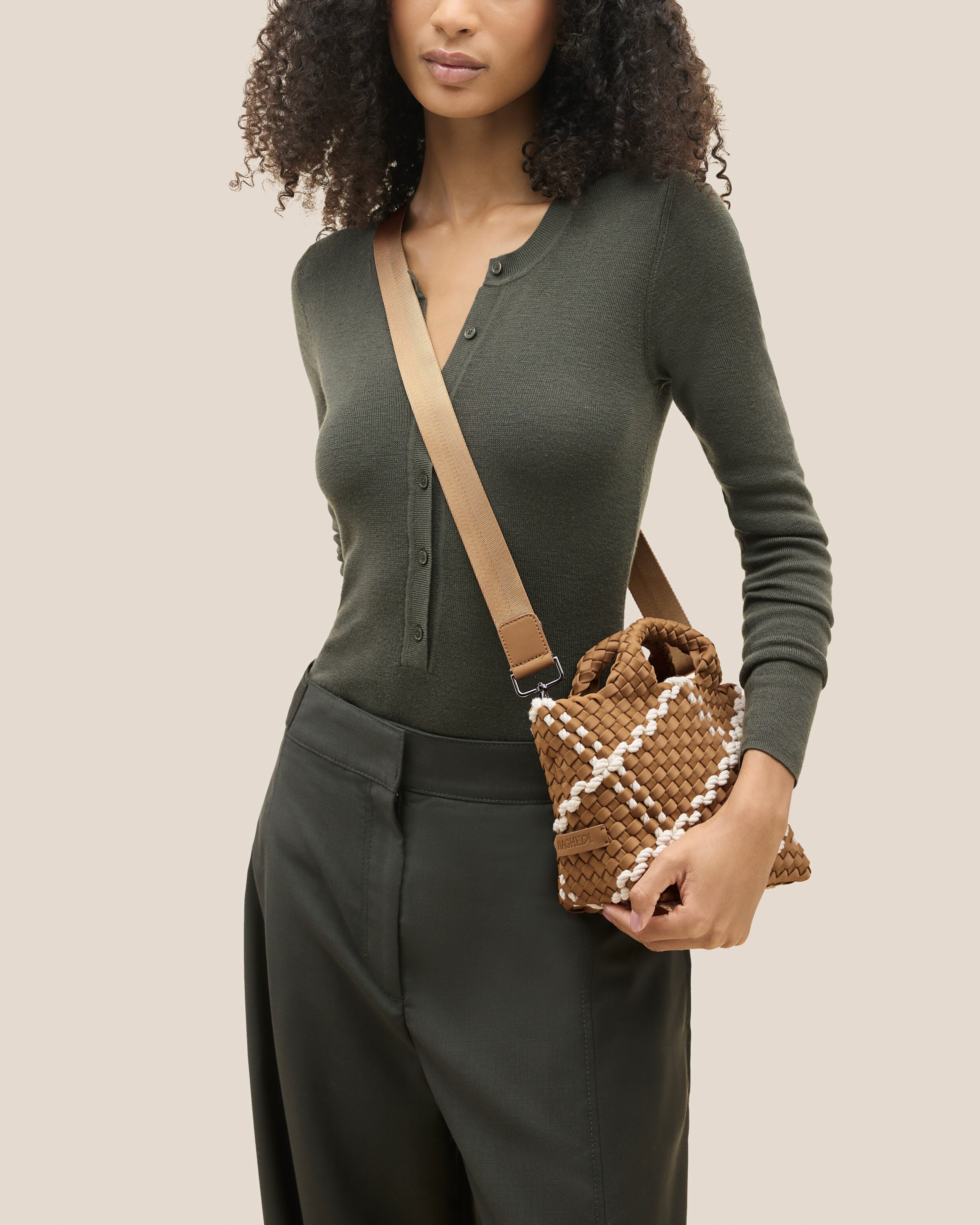 St. Barths Tote in Cove shown on model to illustrate scale and soft silhouette.