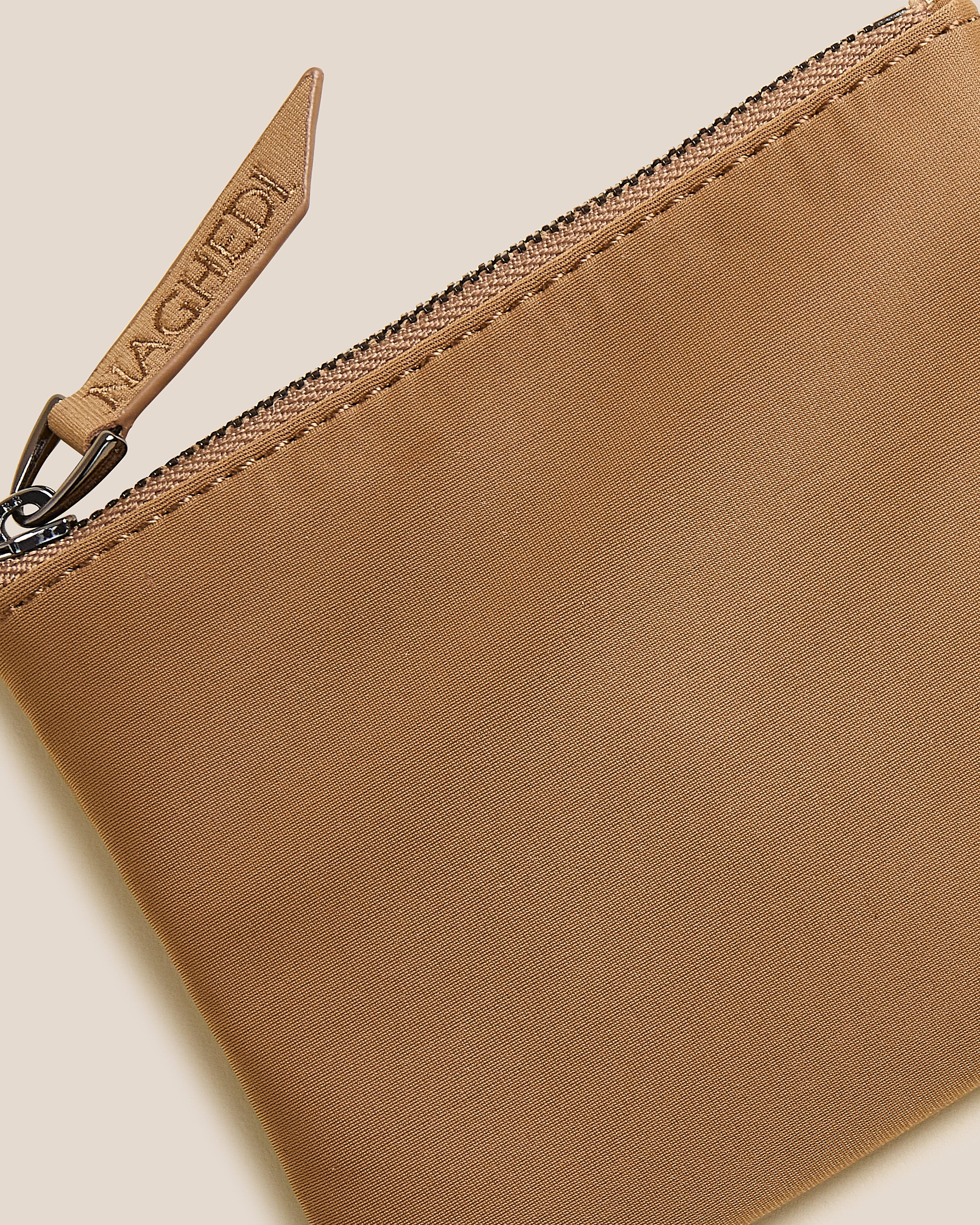 Close-up of included coordinating neoprene zippered pouch.