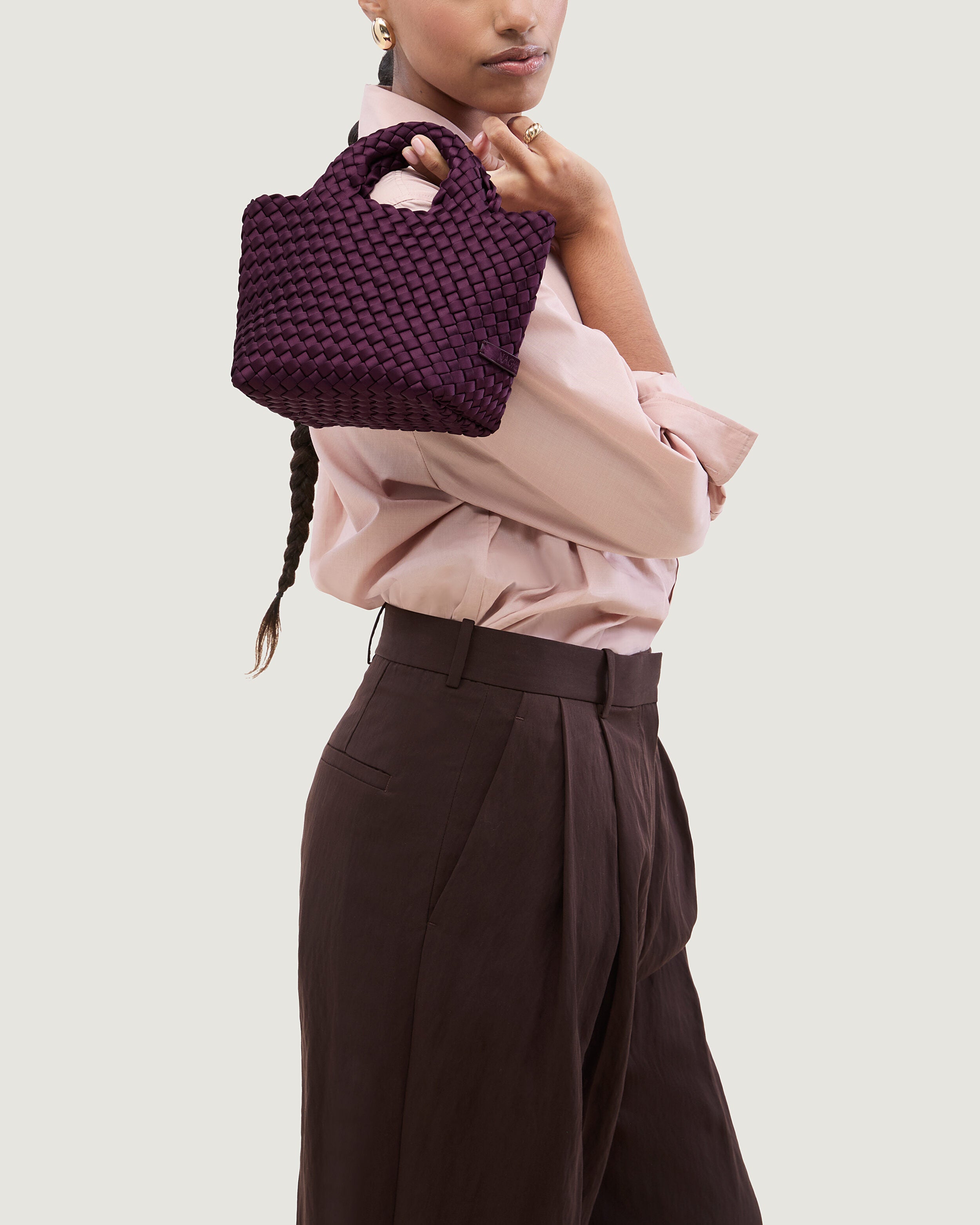 St. Barths Tote in Currant shown on model to illustrate scale and soft silhouette.