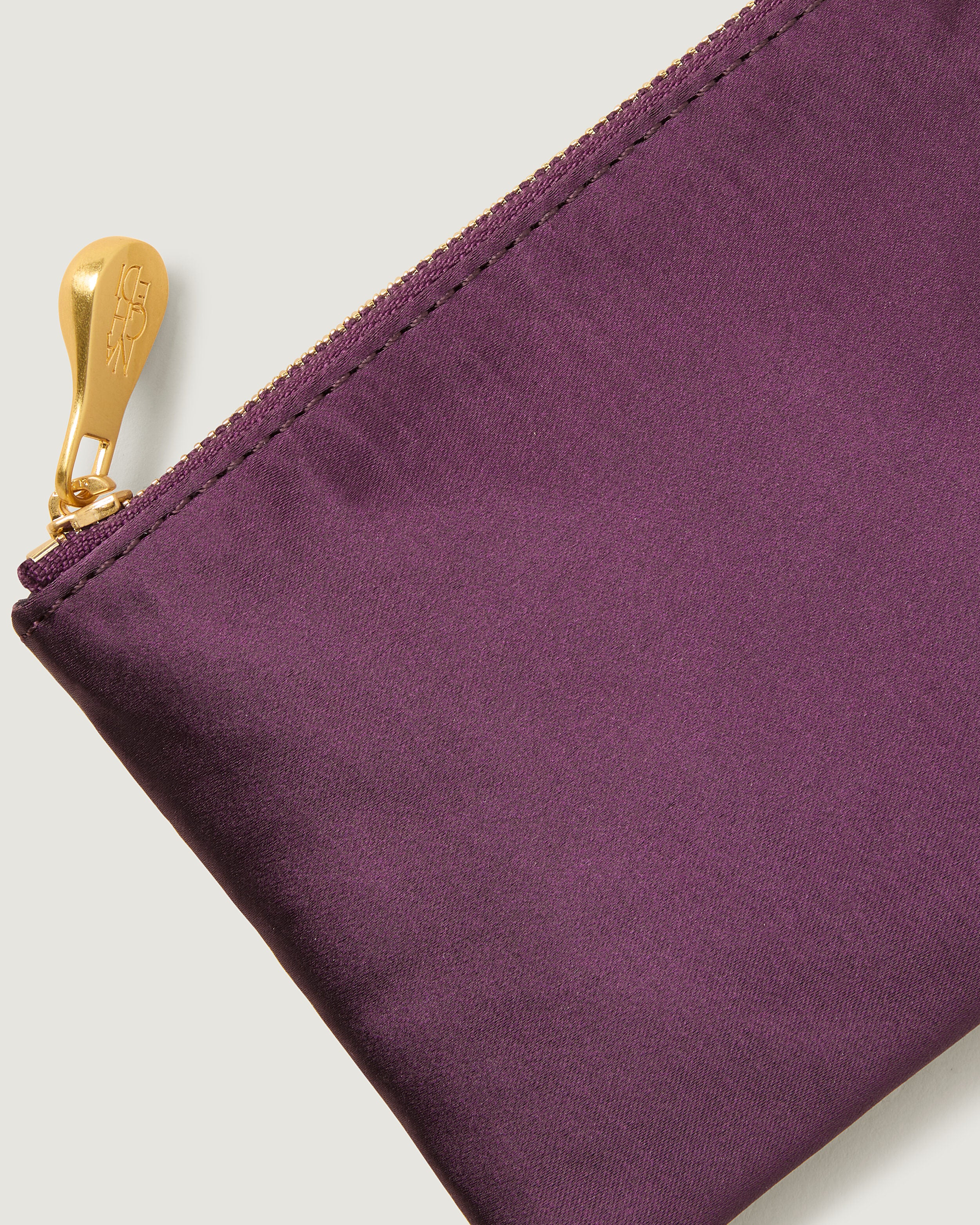 Close-up of included coordinating neoprene zippered pouch.
