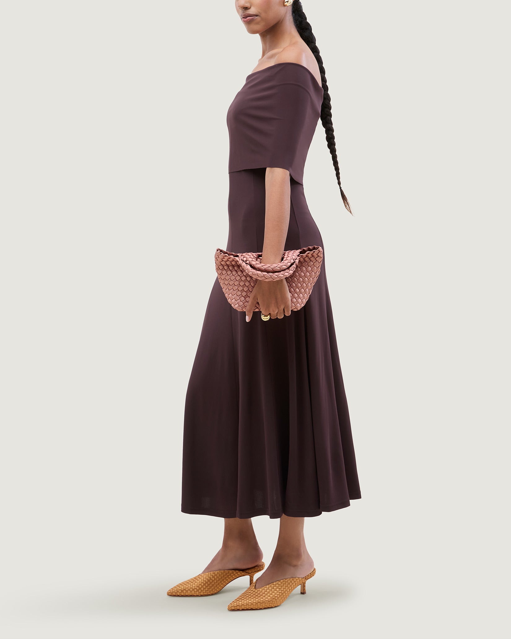 St. Barths Petit Satin Tote Bag in Daphne shown on model to illustrate scale and soft silhouette.