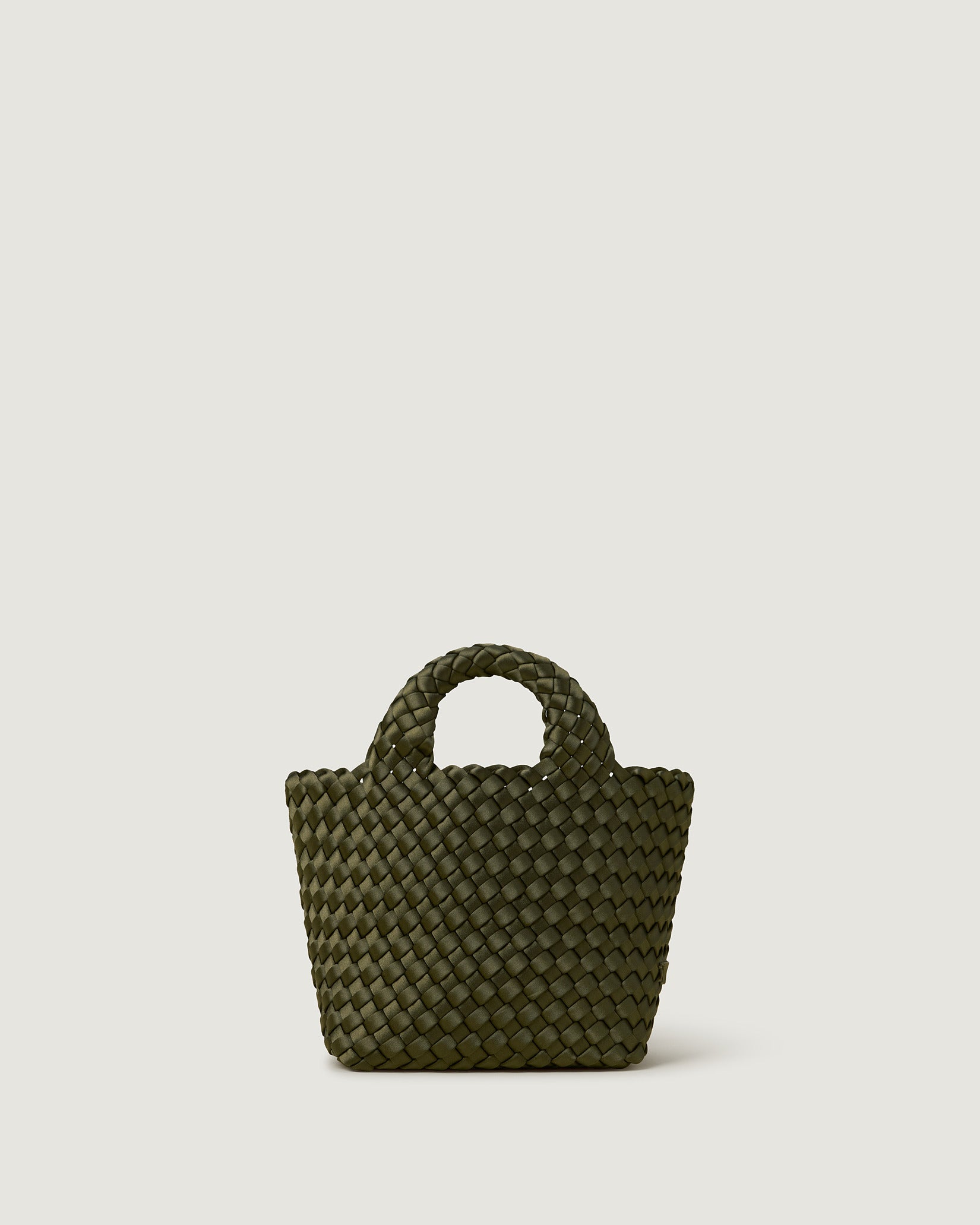St. Barths Petit Satin Tote Bag in Juniper, a forest green  tone, in handwoven neoprene featuring an open top, woven top handles, and detachable, adjustable nylon crossbody strap.