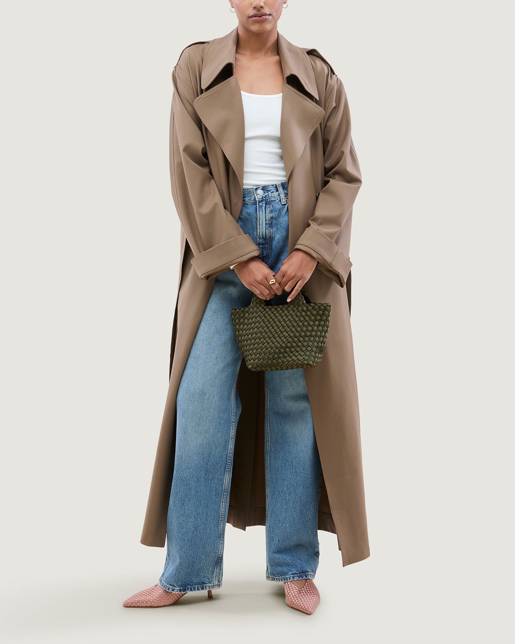 St. Barths Petit Satin Tote Bag in Juniper shown on model to illustrate scale and soft silhouette.