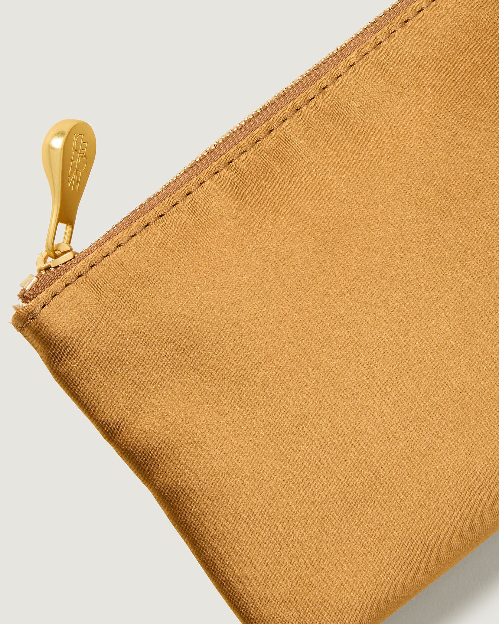 Close-up of included coordinating neoprene zippered pouch.