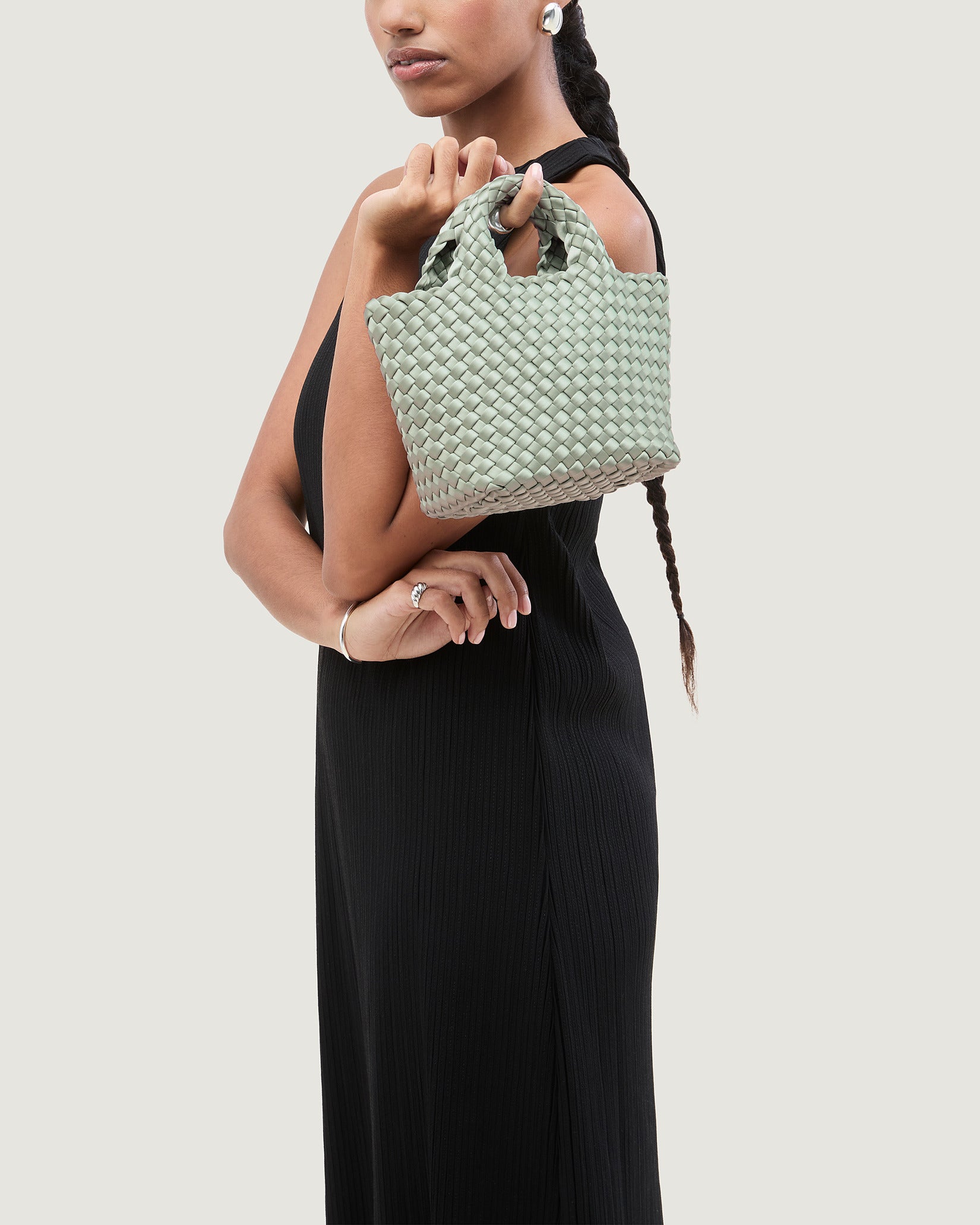 St. Barths Petit Satin Tote Bag in Wintergreen shown on model to illustrate scale and soft silhouette.