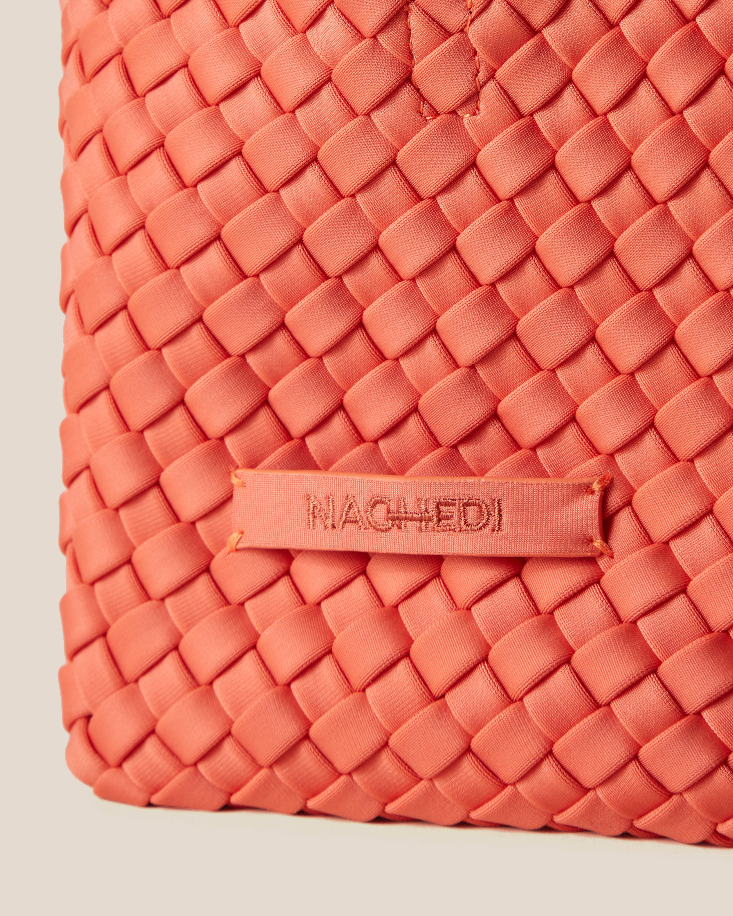 Close-up of stamped NAGHEDI logo on St. Barths Tote in Bonaire.