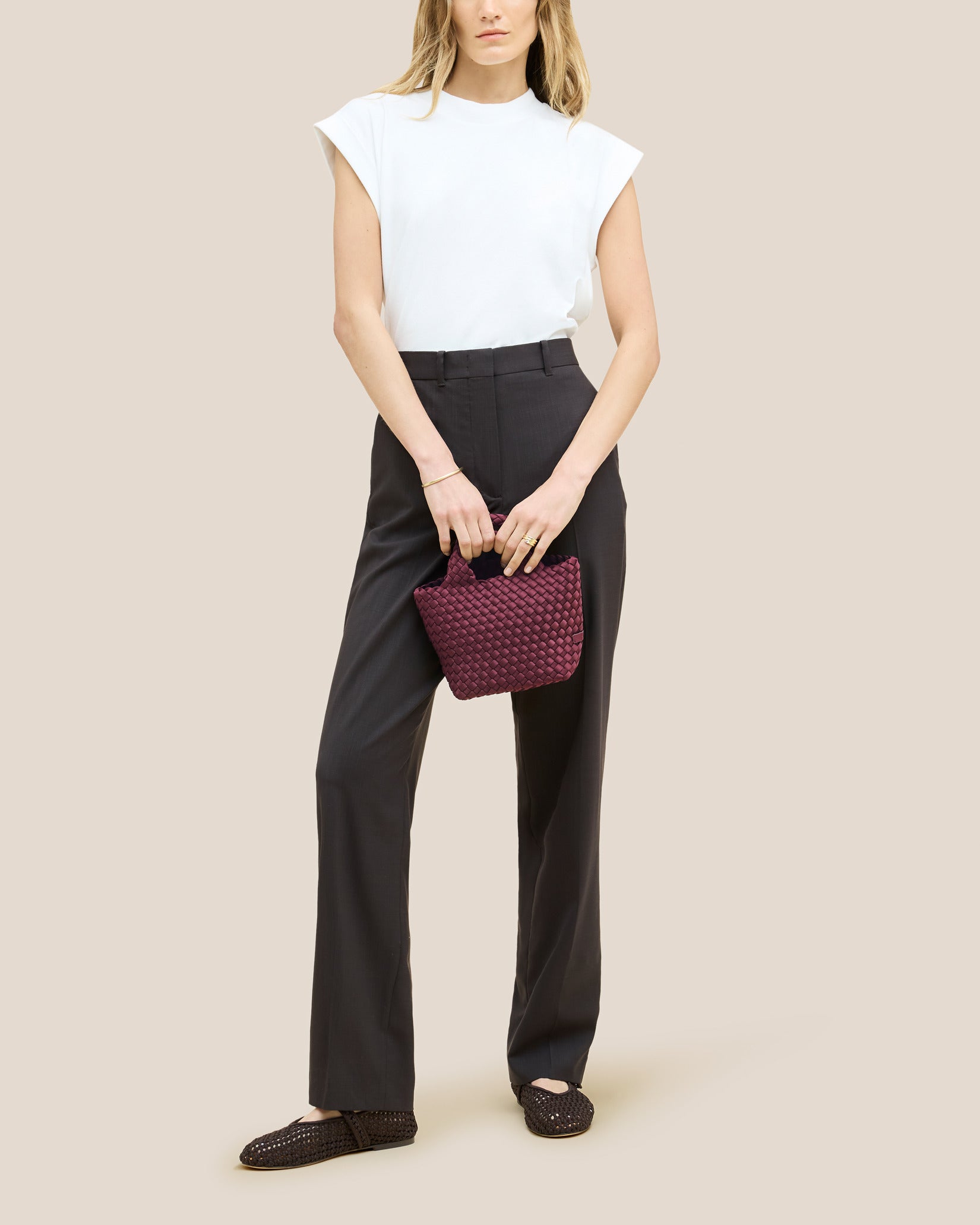 St. Barths Petit Tote Bag in Bordeaux shown on model to illustrate scale and soft silhouette.