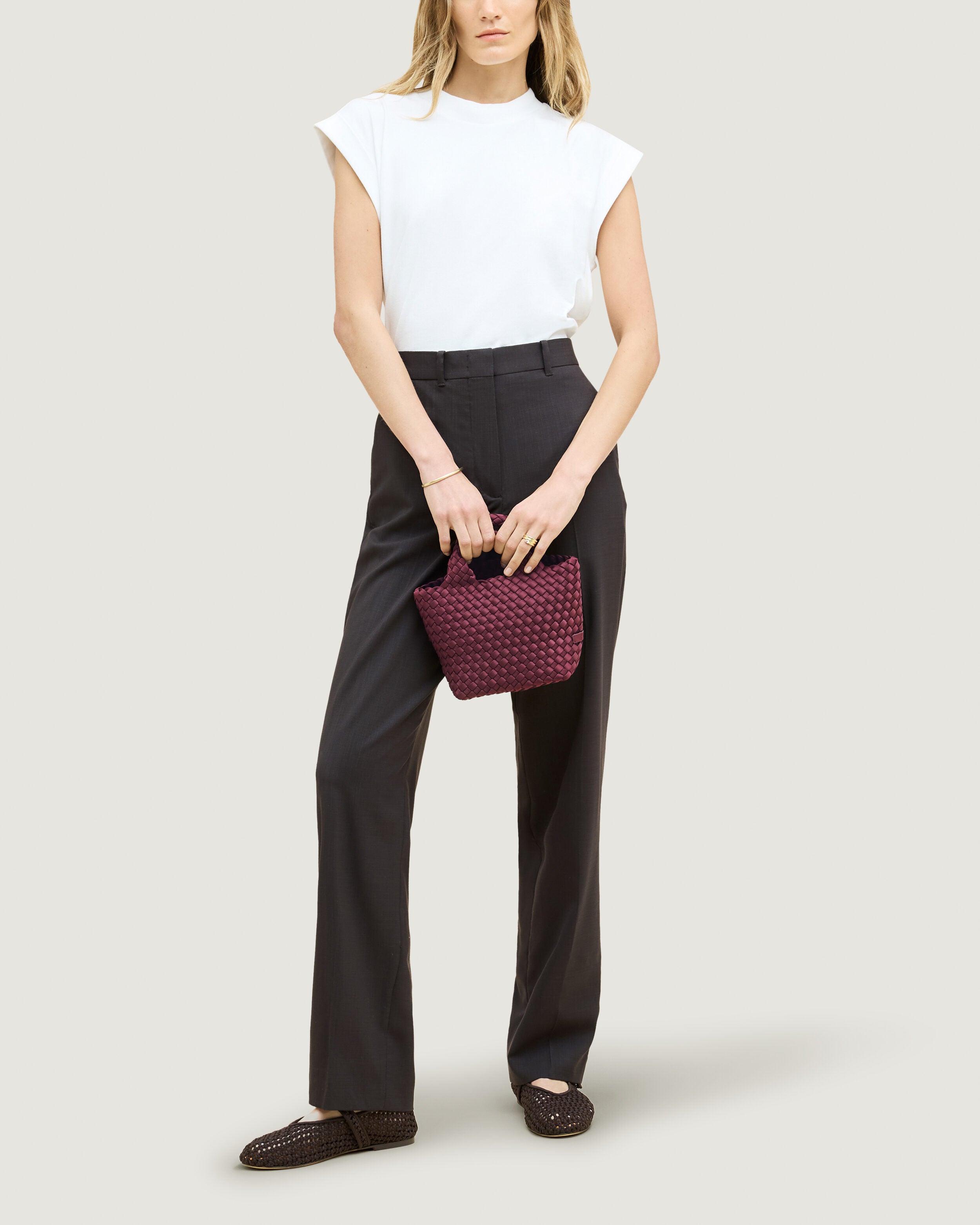 St. Barths Tote in Bordeaux shown on model to illustrate scale and soft silhouette.