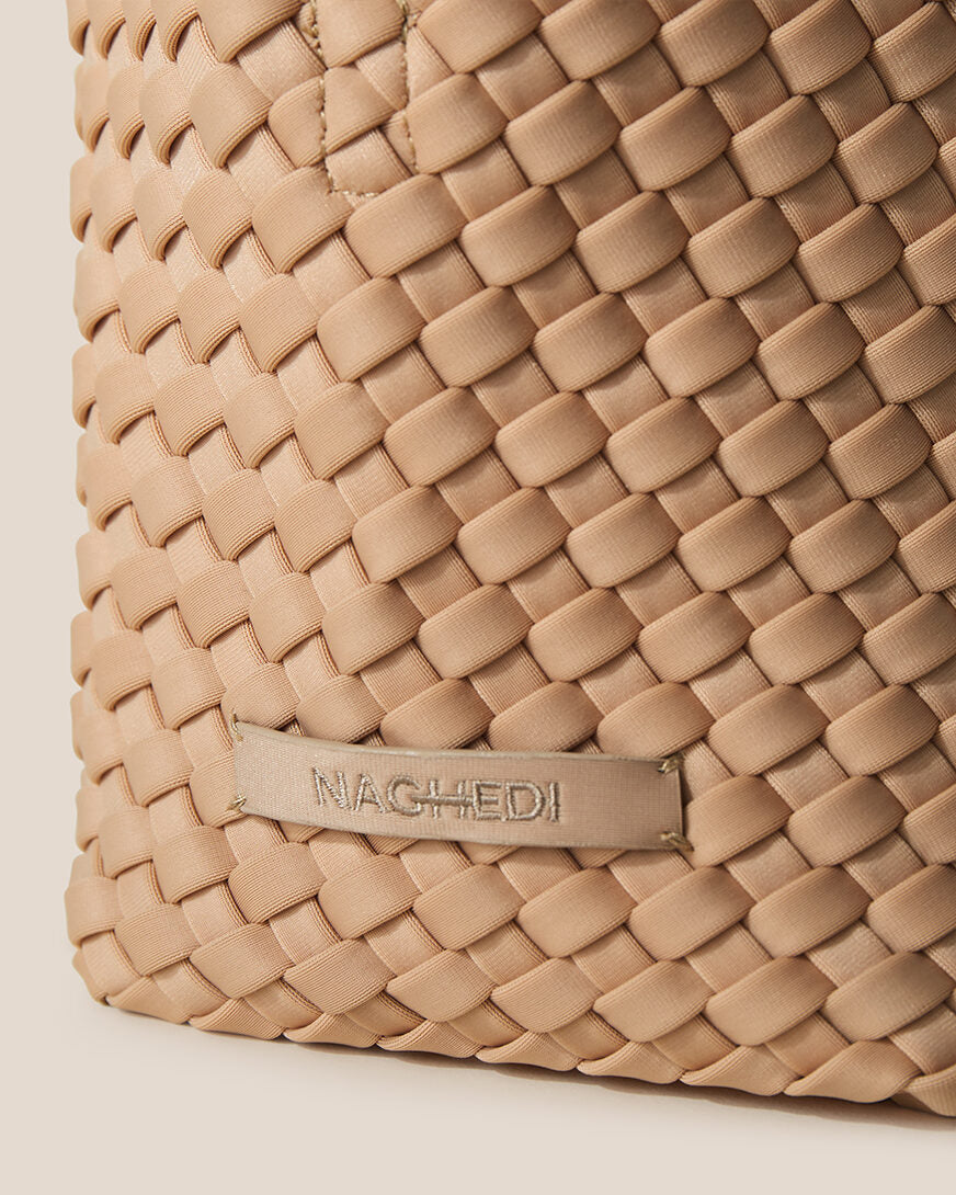 Close-up of stamped NAGHEDI logo on St. Barths Tote in Camel.