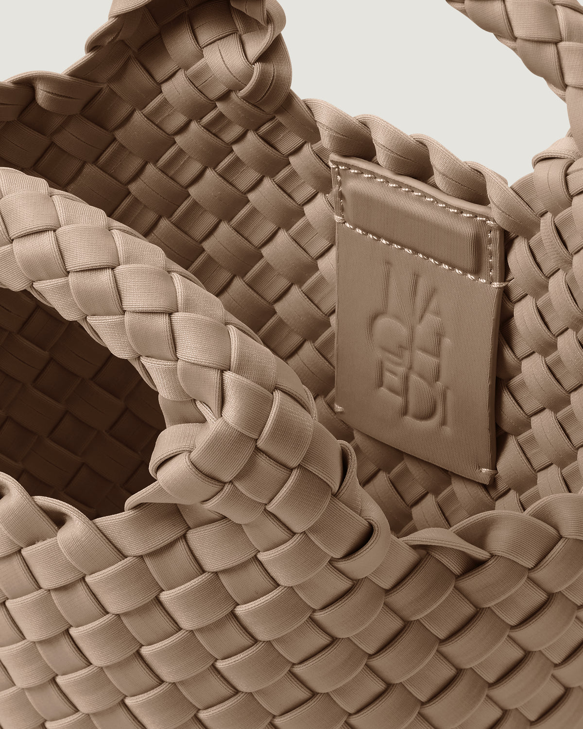 Interior close-up of St. Barths Tote in Cashmere showing its magnetic snap closure, and unlined interior.