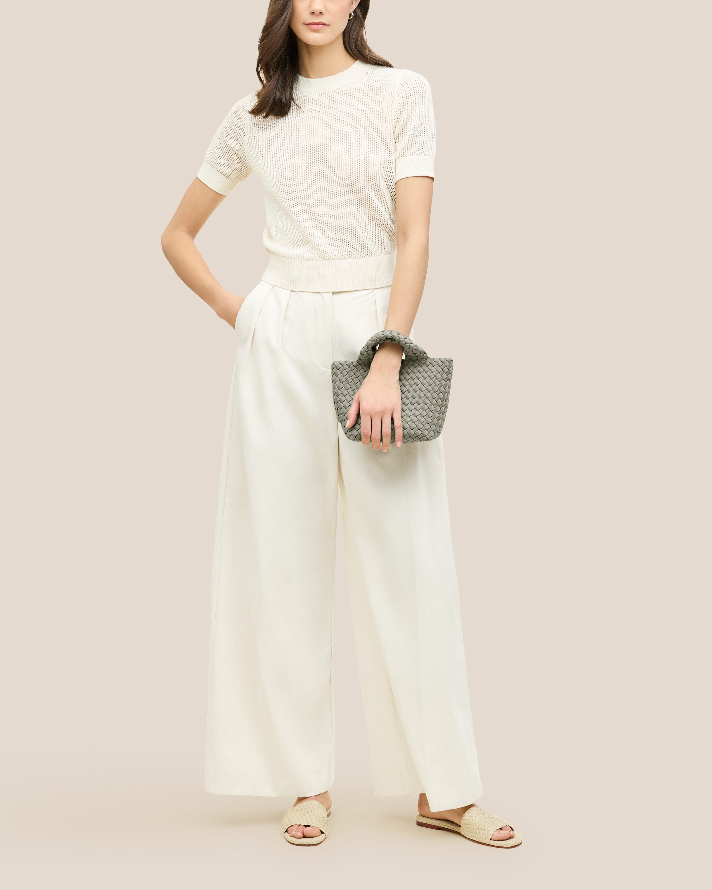 St. Barths Tote in Celadon shown on model to illustrate scale and soft silhouette.