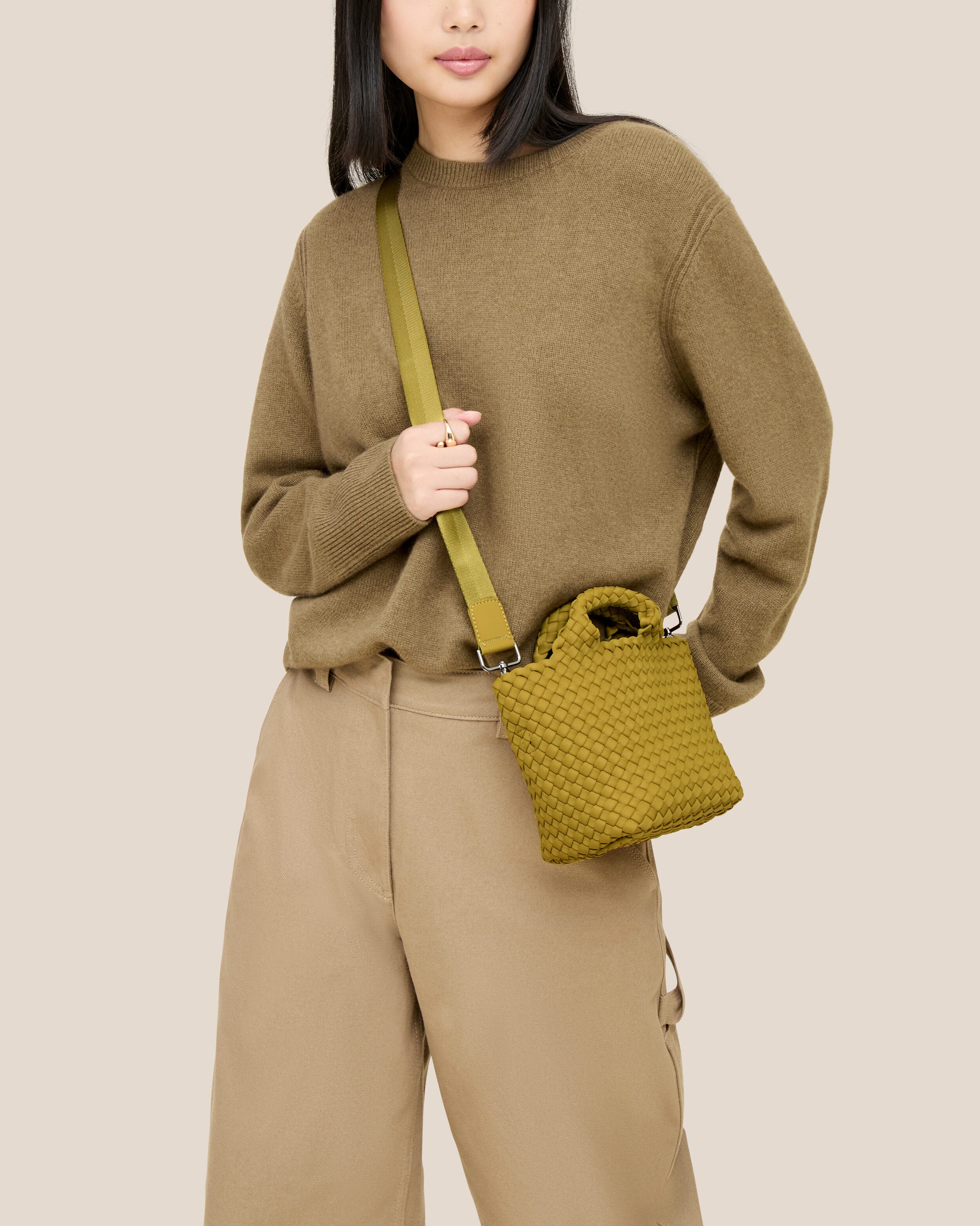St. Barths Tote in Chartreuse shown on model to illustrate scale and soft silhouette.