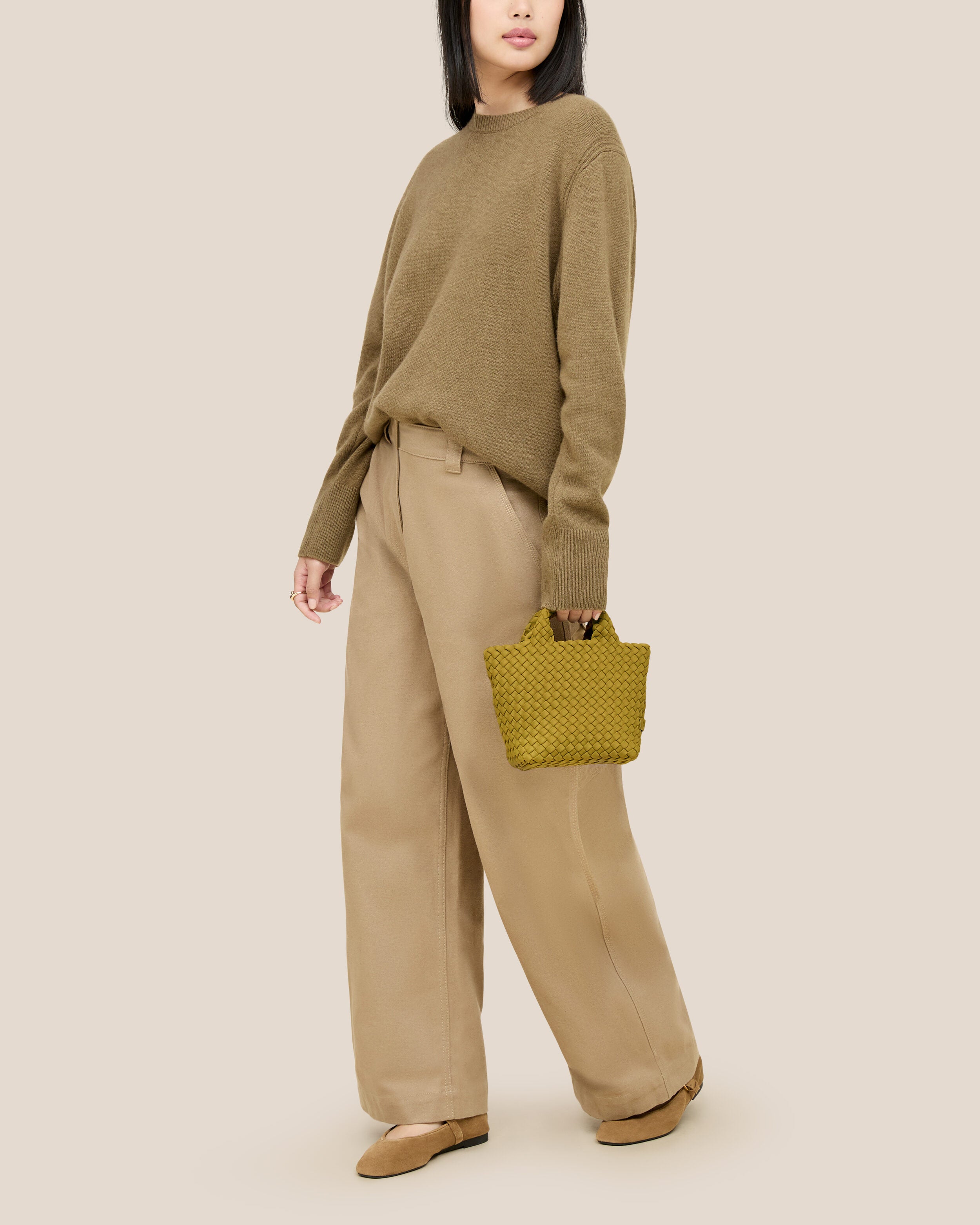 St. Barths Tote in Chartreuse shown on model to illustrate scale and soft silhouette.