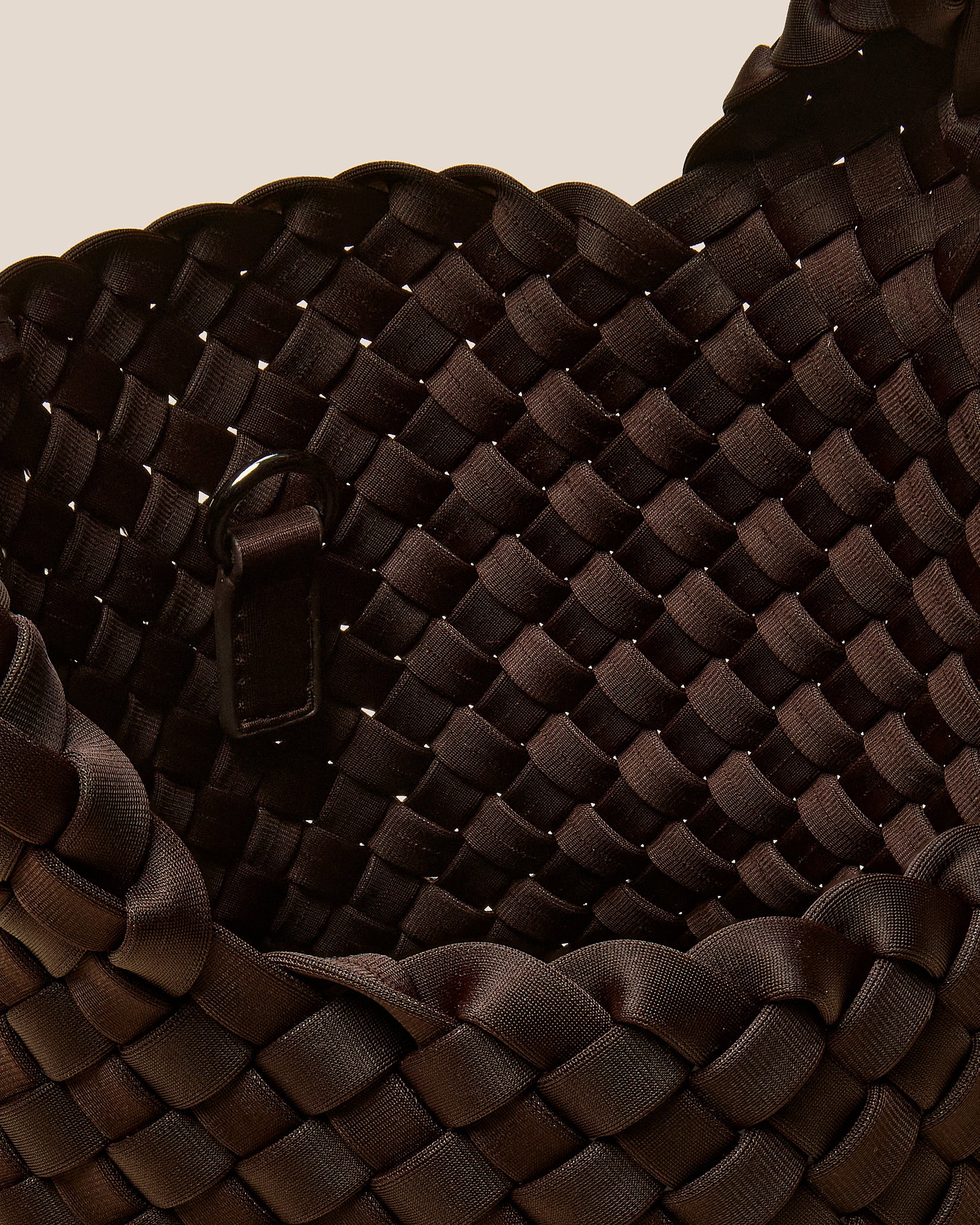 Interior close-up of St. Barths Petit Tote Bag in Chocolate showing its open top, and unlined interior.