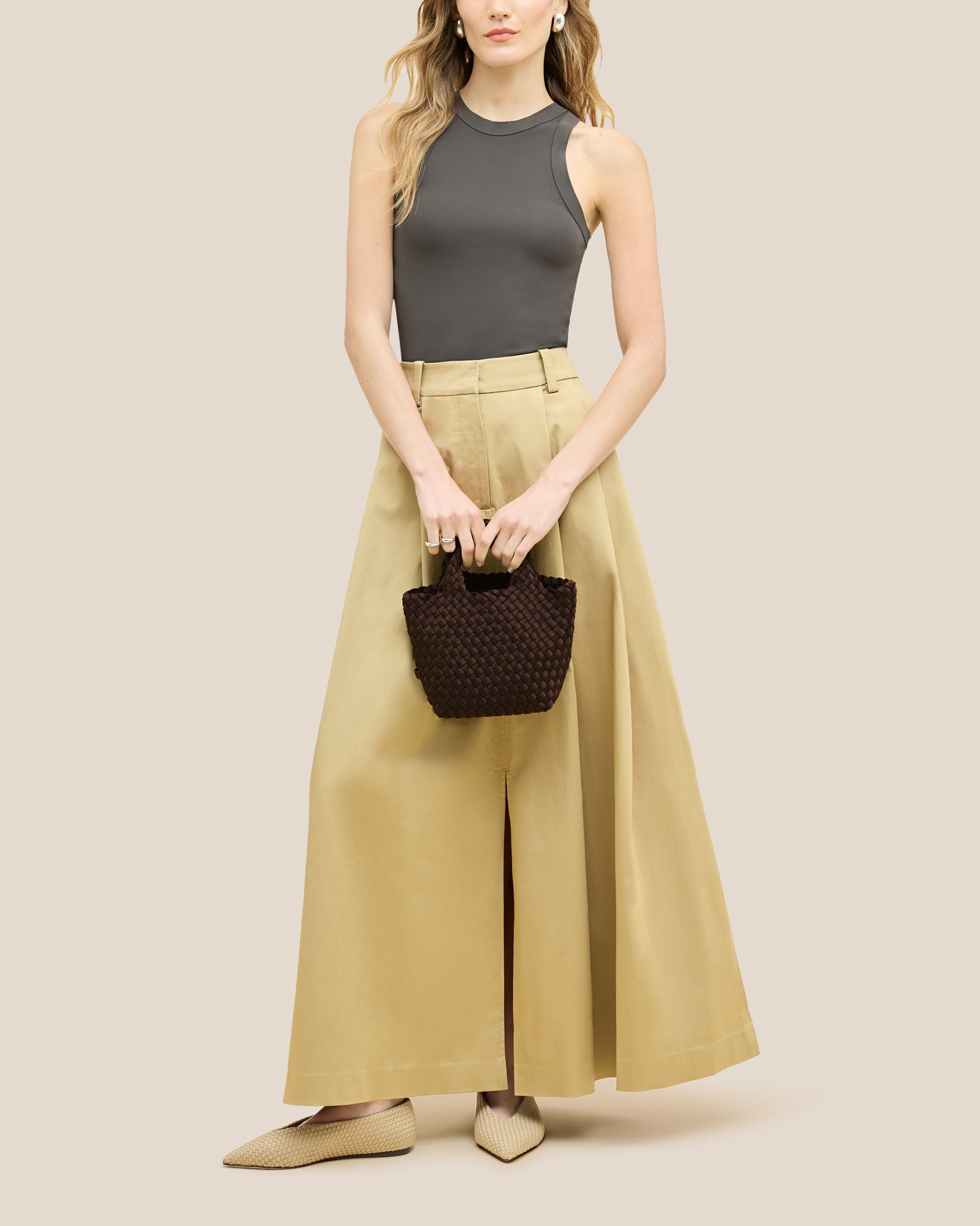 St. Barths Petit Tote Bag in Chocolate shown on model to illustrate scale and soft silhouette.