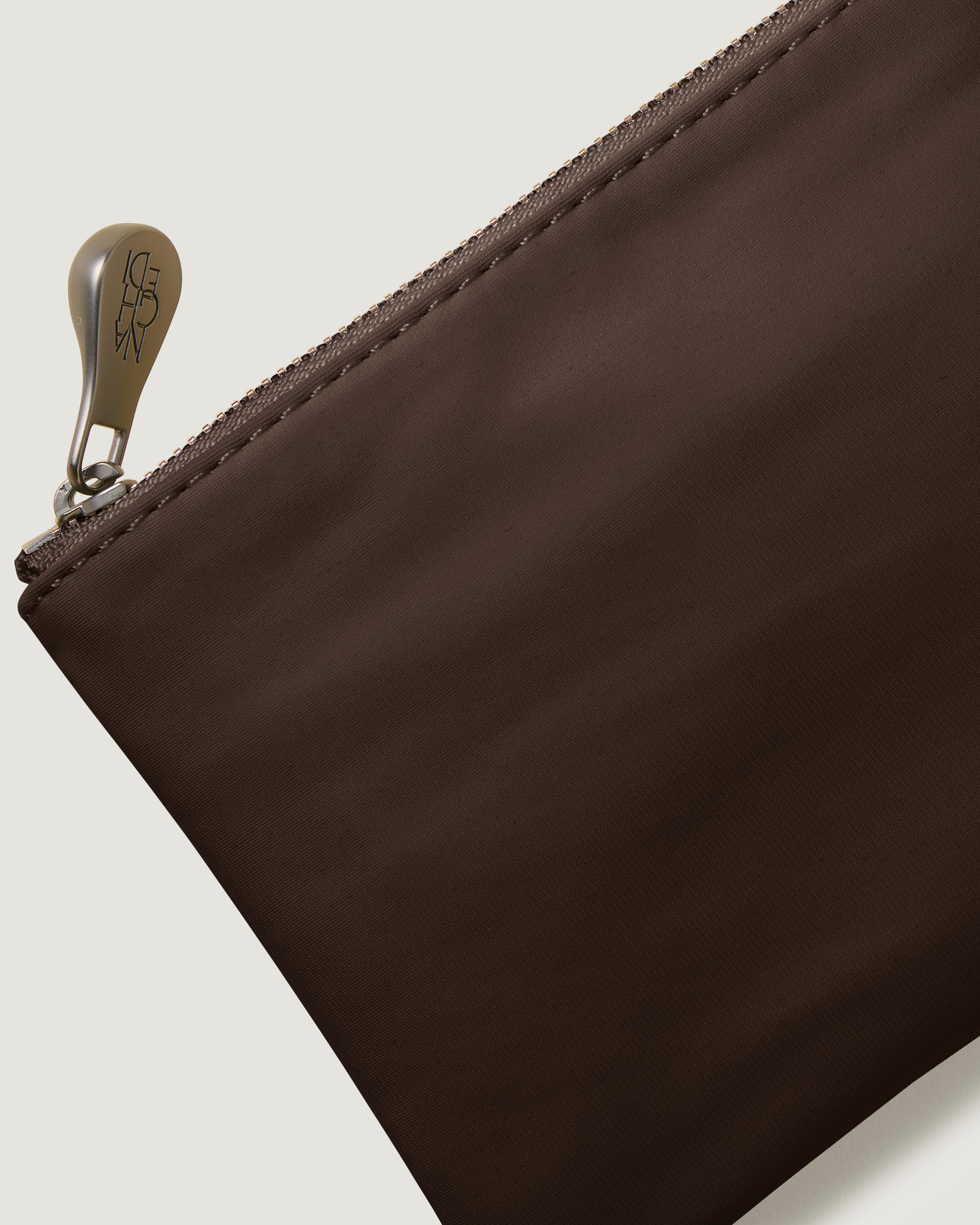 Close-up of included coordinating neoprene zippered pouch.