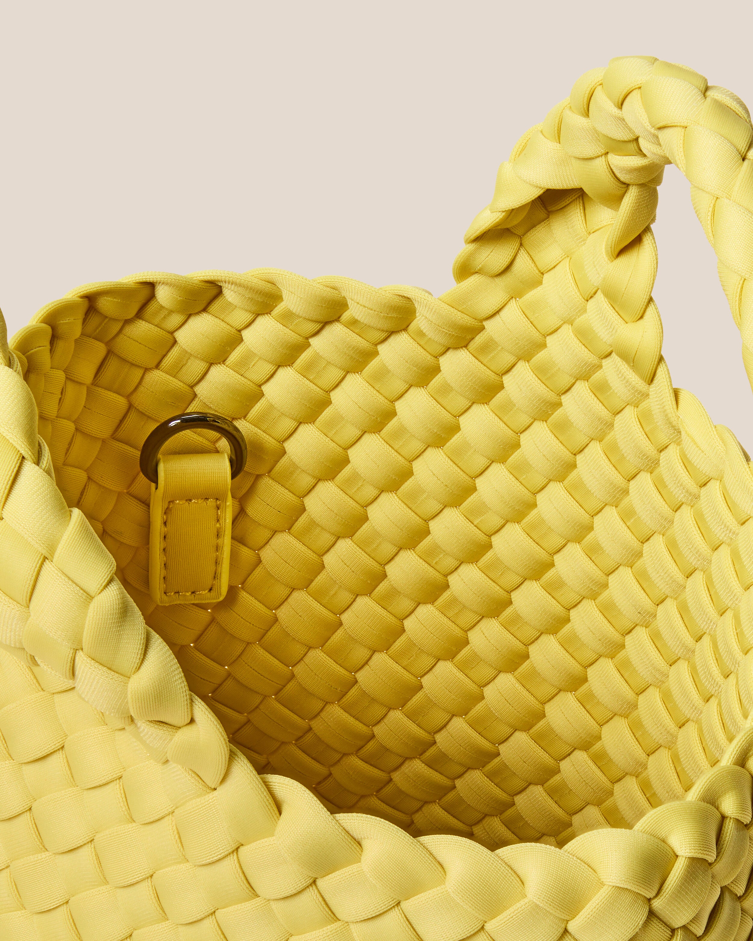 Interior close-up of St. Barths Tote in Citron showing its open top, and unlined interior.