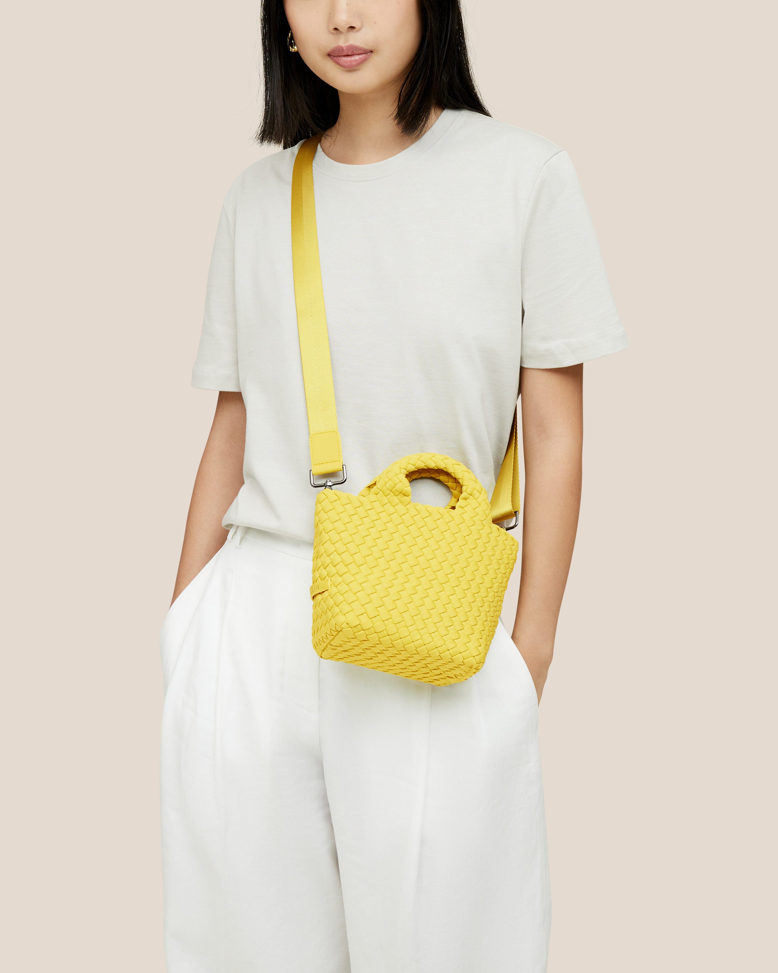 St. Barths Tote in Citron shown on model to illustrate scale and soft silhouette.