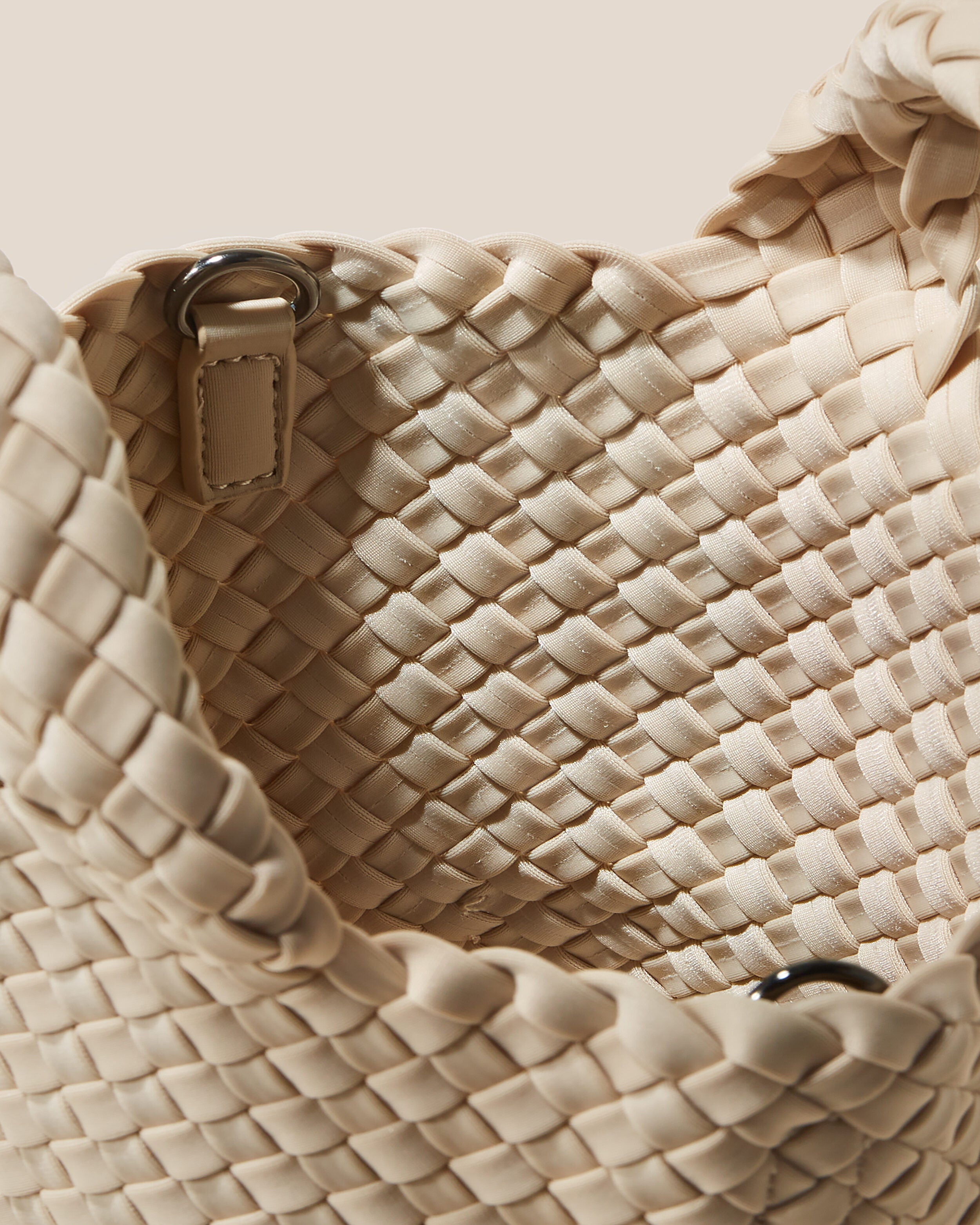 Interior close-up of St. Barths Tote in Ecru showing its open top, and unlined interior.