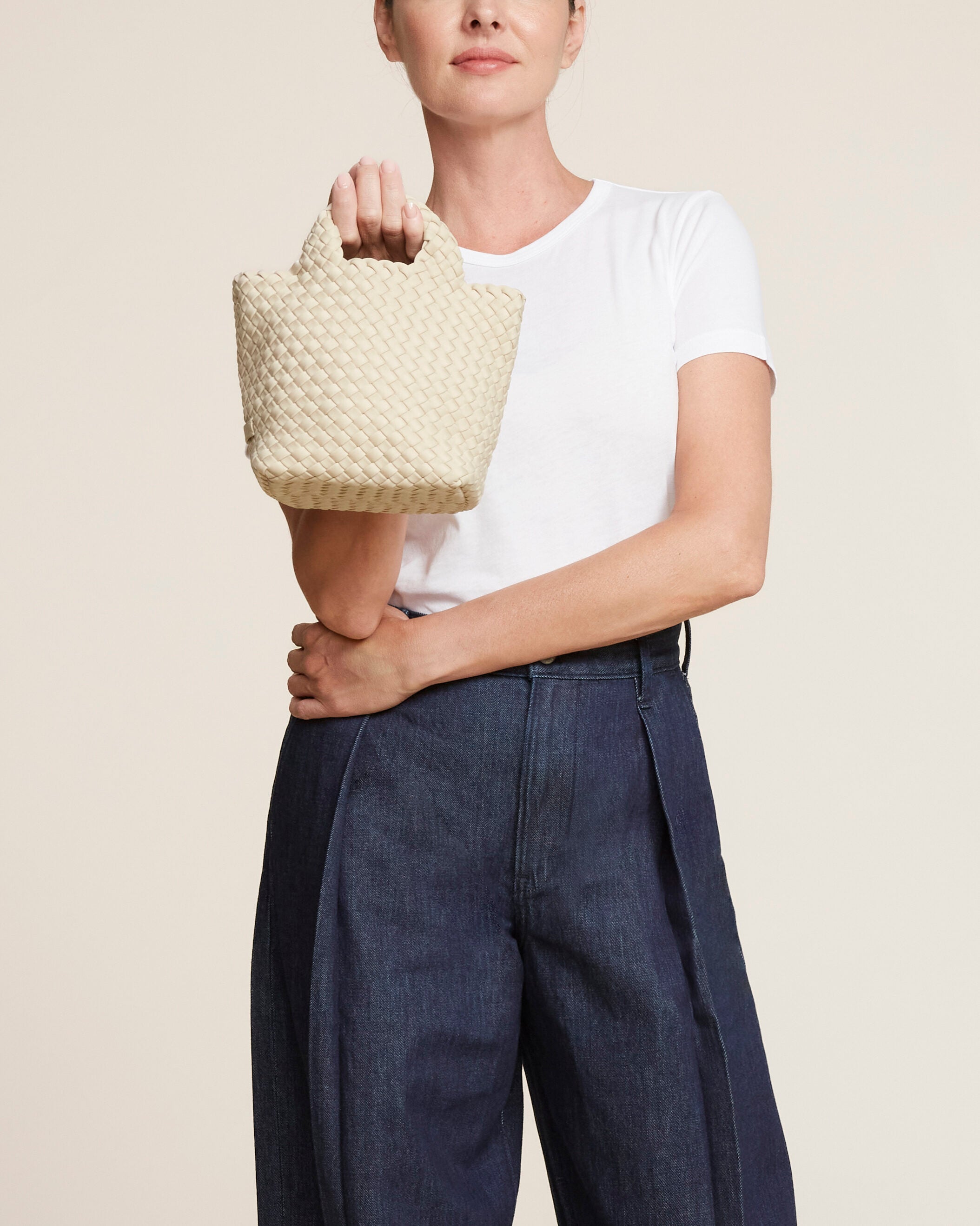 St. Barths Tote in Ecru shown on model to illustrate scale and soft silhouette.