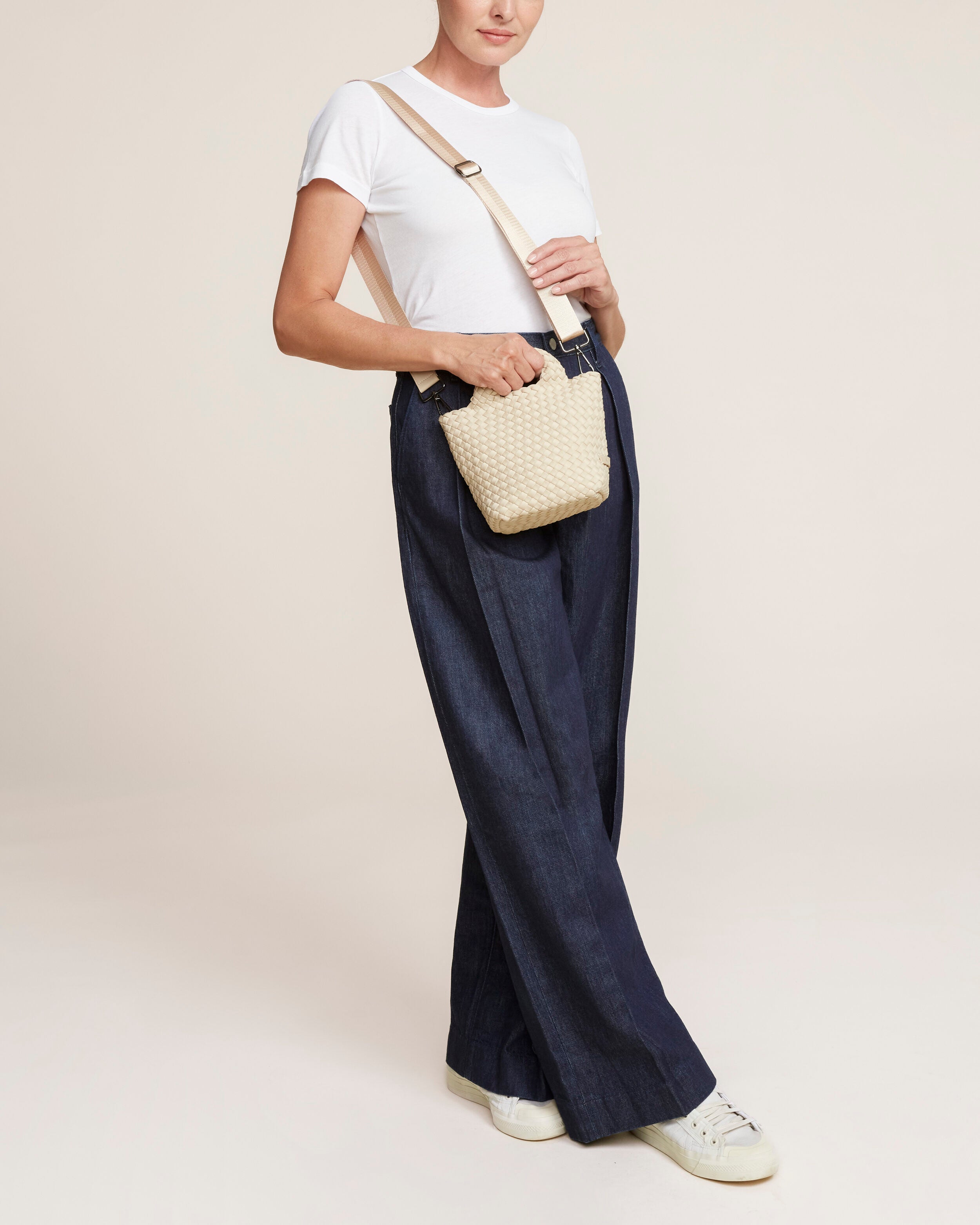 St. Barths Tote in Ecru shown on model to illustrate scale and soft silhouette.