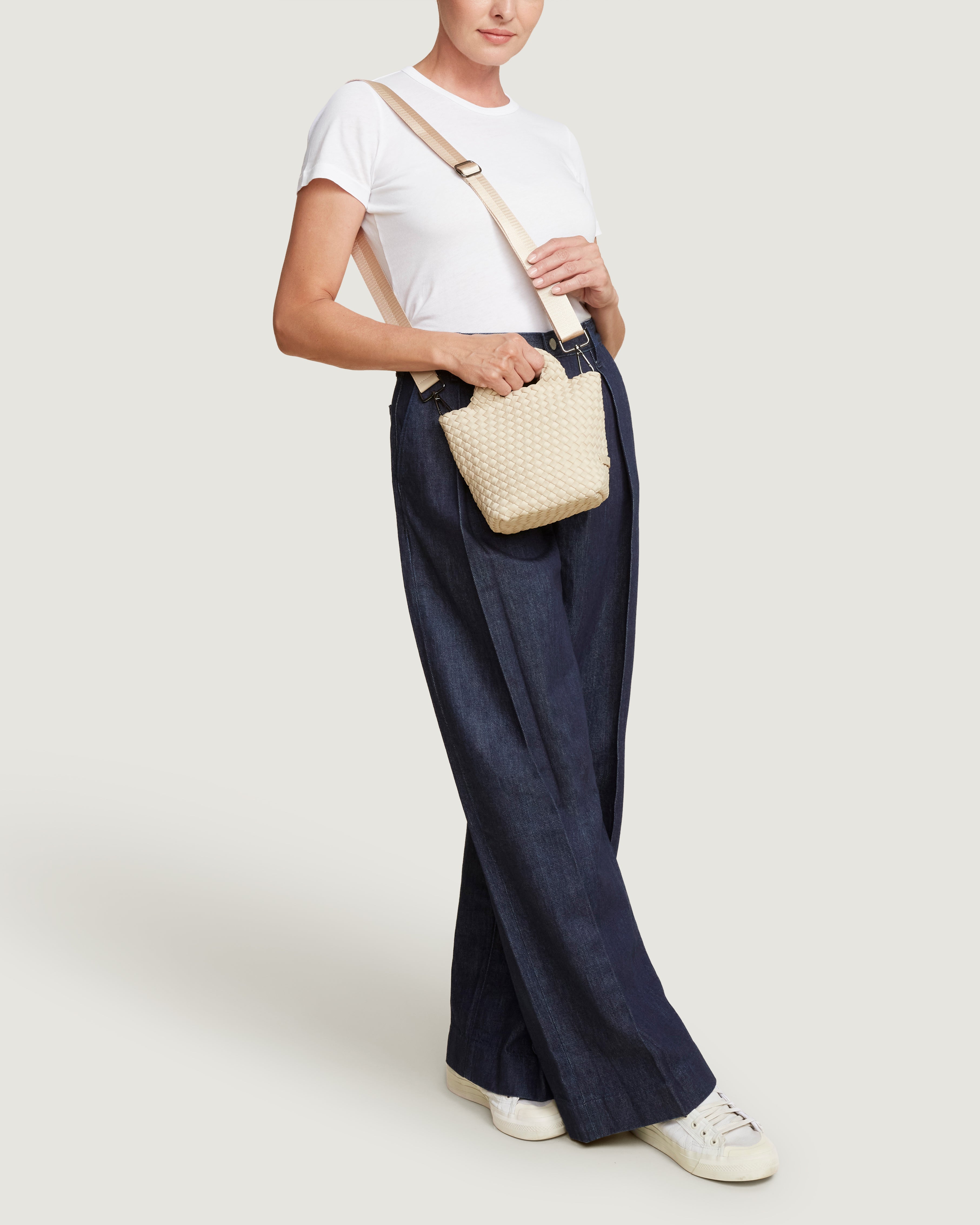 St. Barths Tote in Ecru shown on model to illustrate scale and soft silhouette.