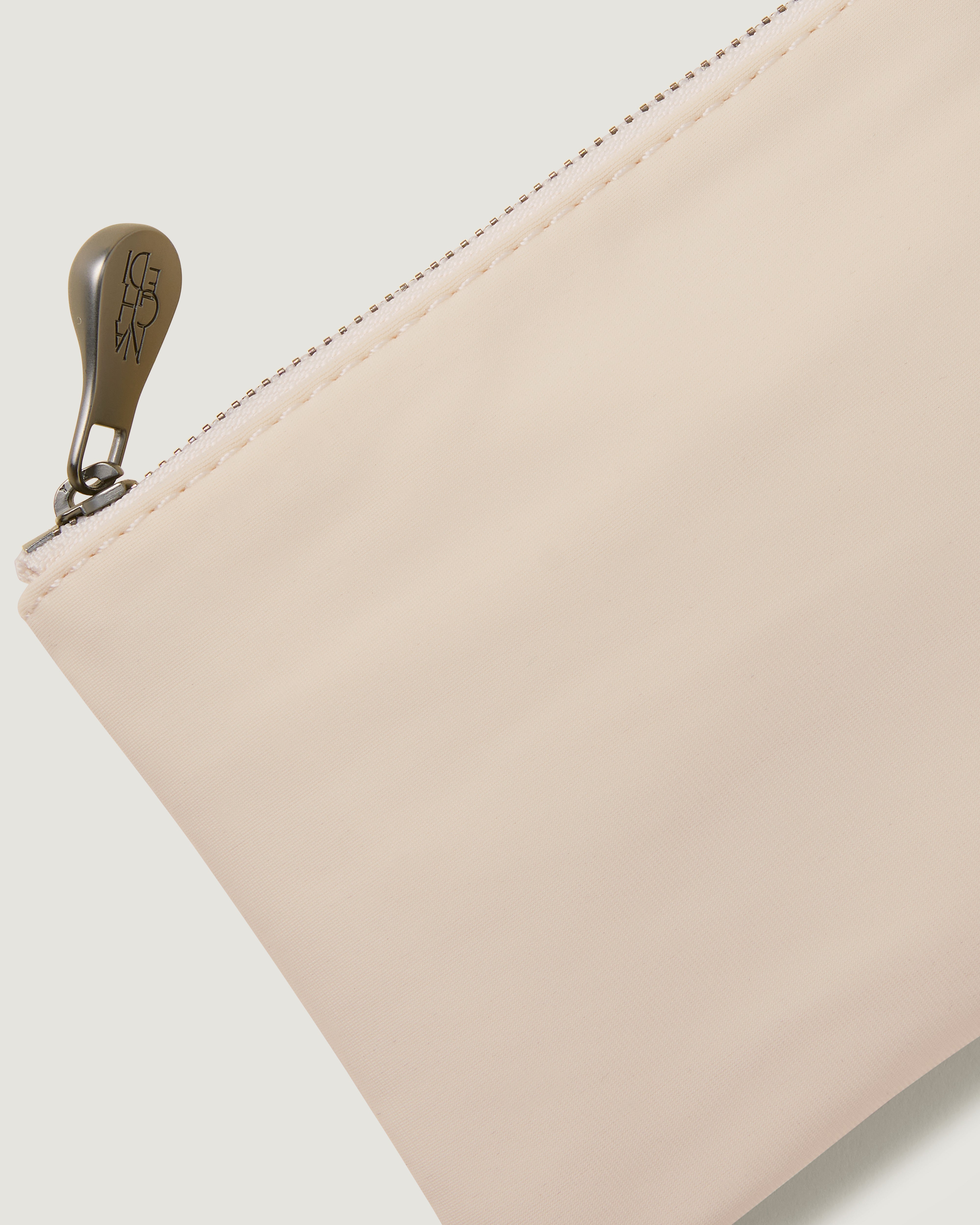 Close-up of included coordinating neoprene zippered pouch.