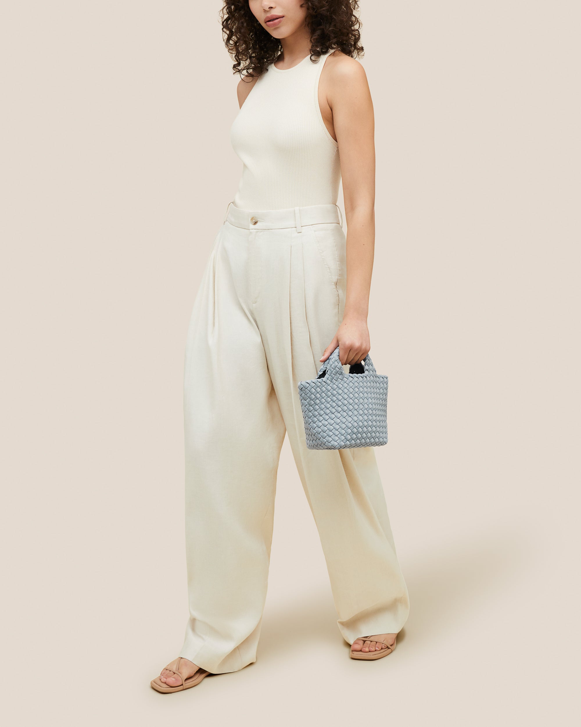 St. Barths Tote in Glacier shown on model to illustrate scale and soft silhouette.