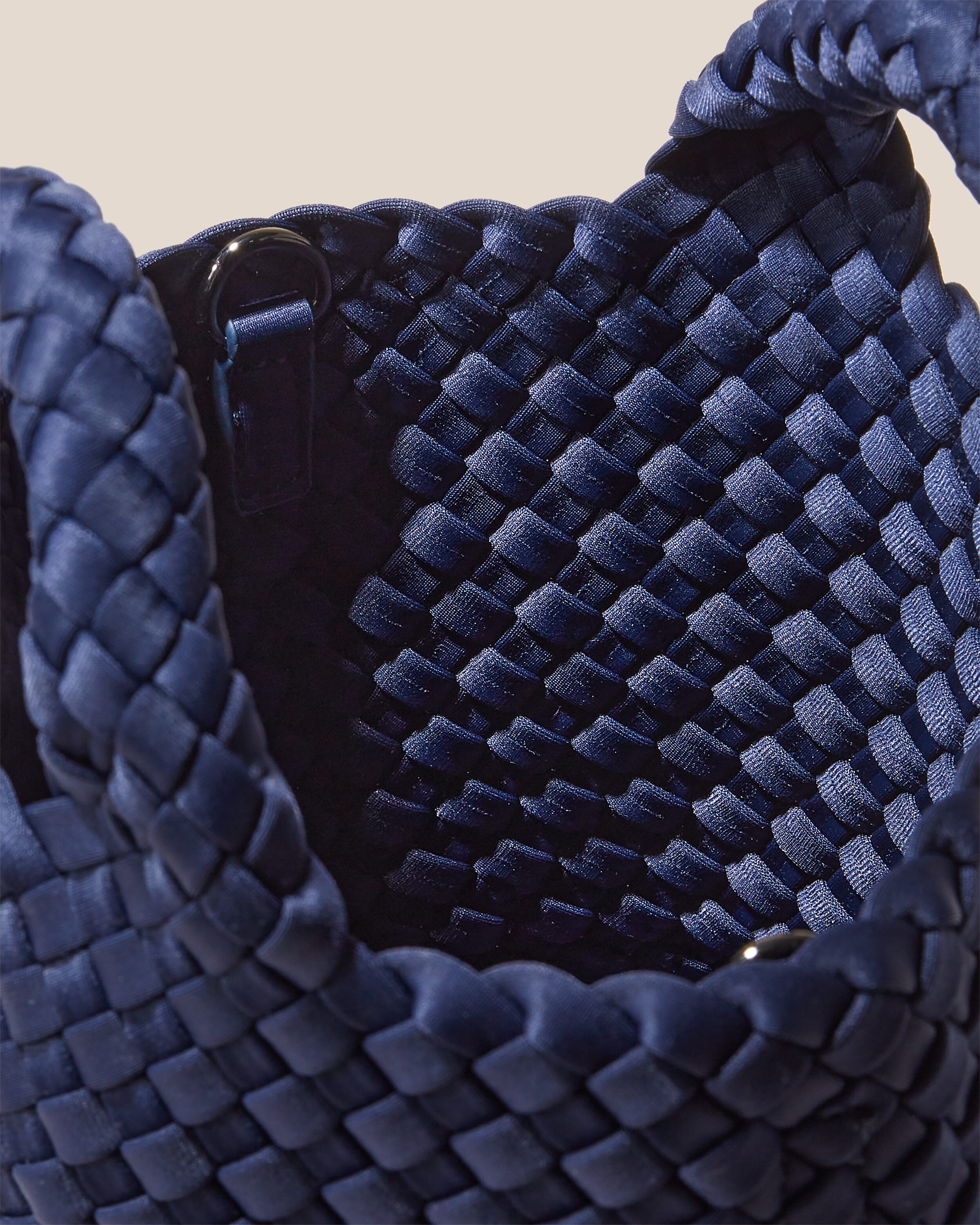 Interior close-up of St. Barths Tote in Ink Blue showing its open top, and unlined interior.