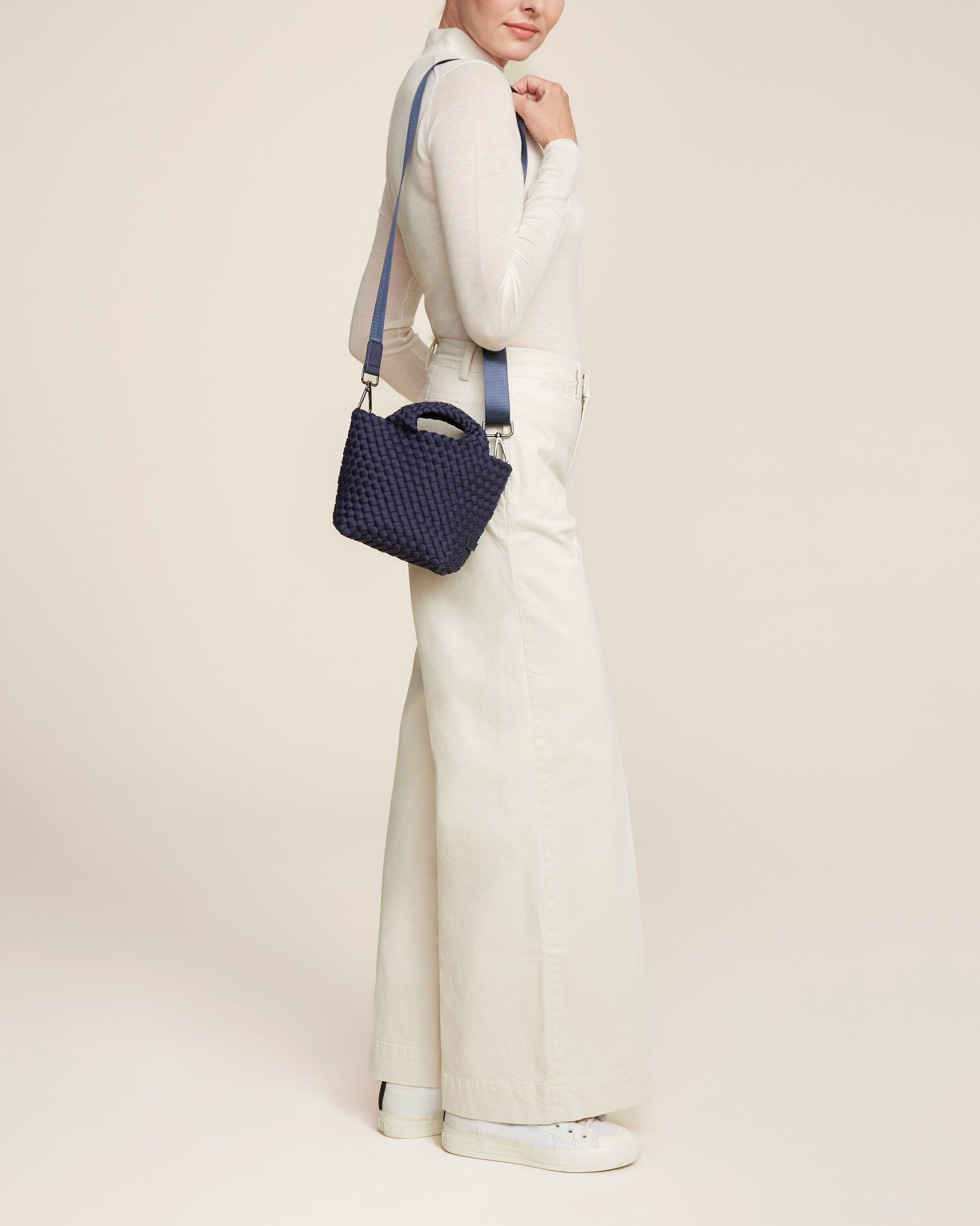 St. Barths Tote in Ink Blue shown on model to illustrate scale and soft silhouette.